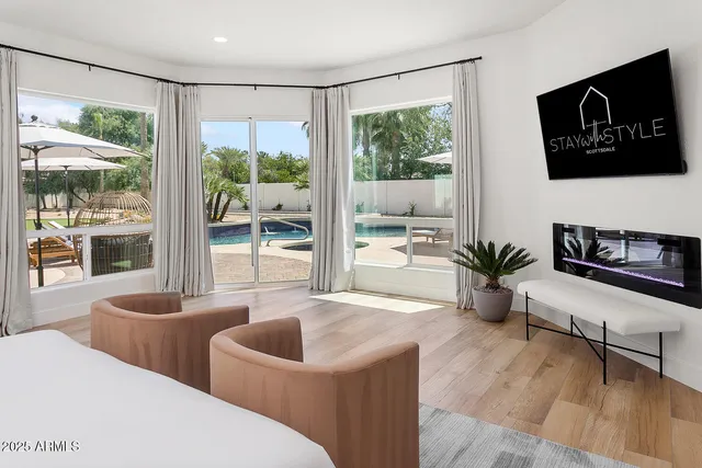 an aerial view of residential houses with outdoor space