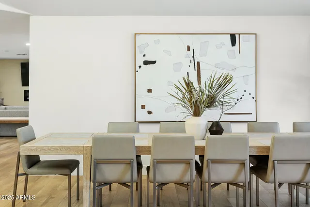 a kitchen with stainless steel appliances a refrigerator and a sink