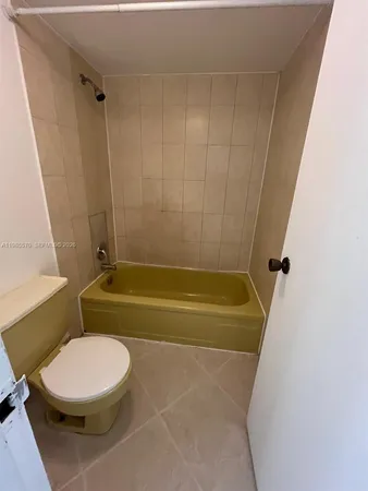 a bathroom with a sink and toilet