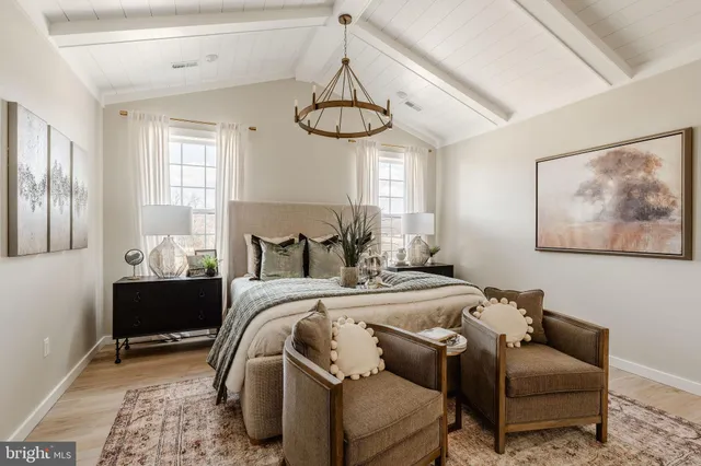 a bed room with a bed and a couch