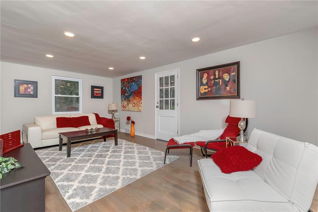 626 Kelso Road Pittsburgh, PA 15243 - Photo 3 of 25 Entertain Family & Friends in the Living Room. Notice the Refinished Hardwood Floors and Recessed Lighting.