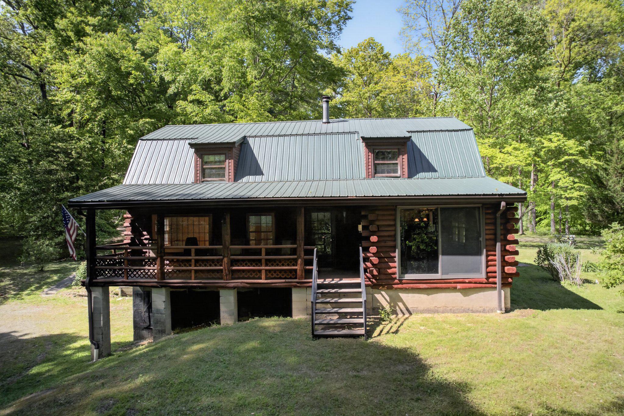 403 Union Church Road Townsend, DE 19734 - Photo 5 of 73 Charming log cabin nestled in nature.