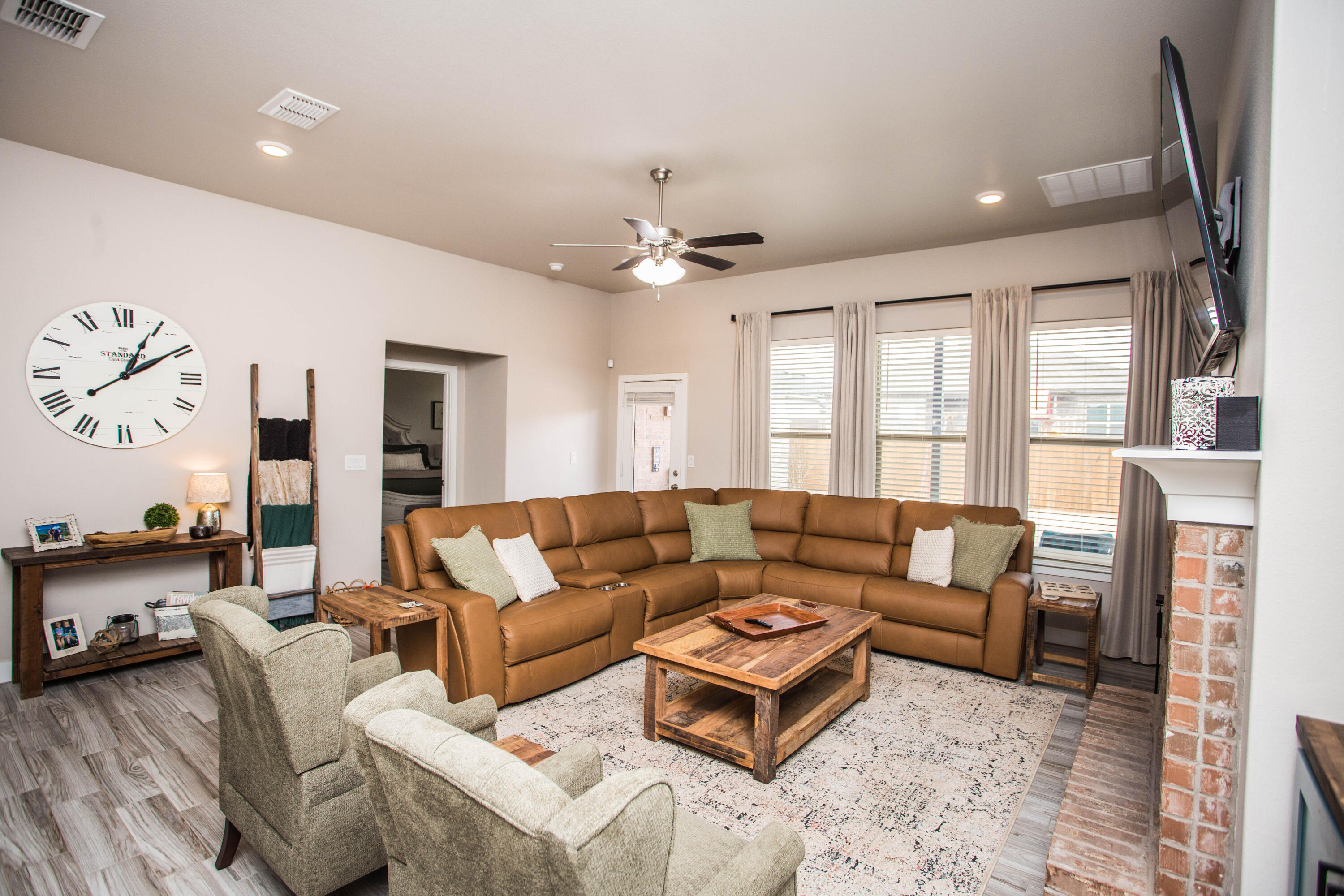 1932 142nd Street Lubbock, TX 79423 - Photo 11 of 38 a living room with furniture and a large window