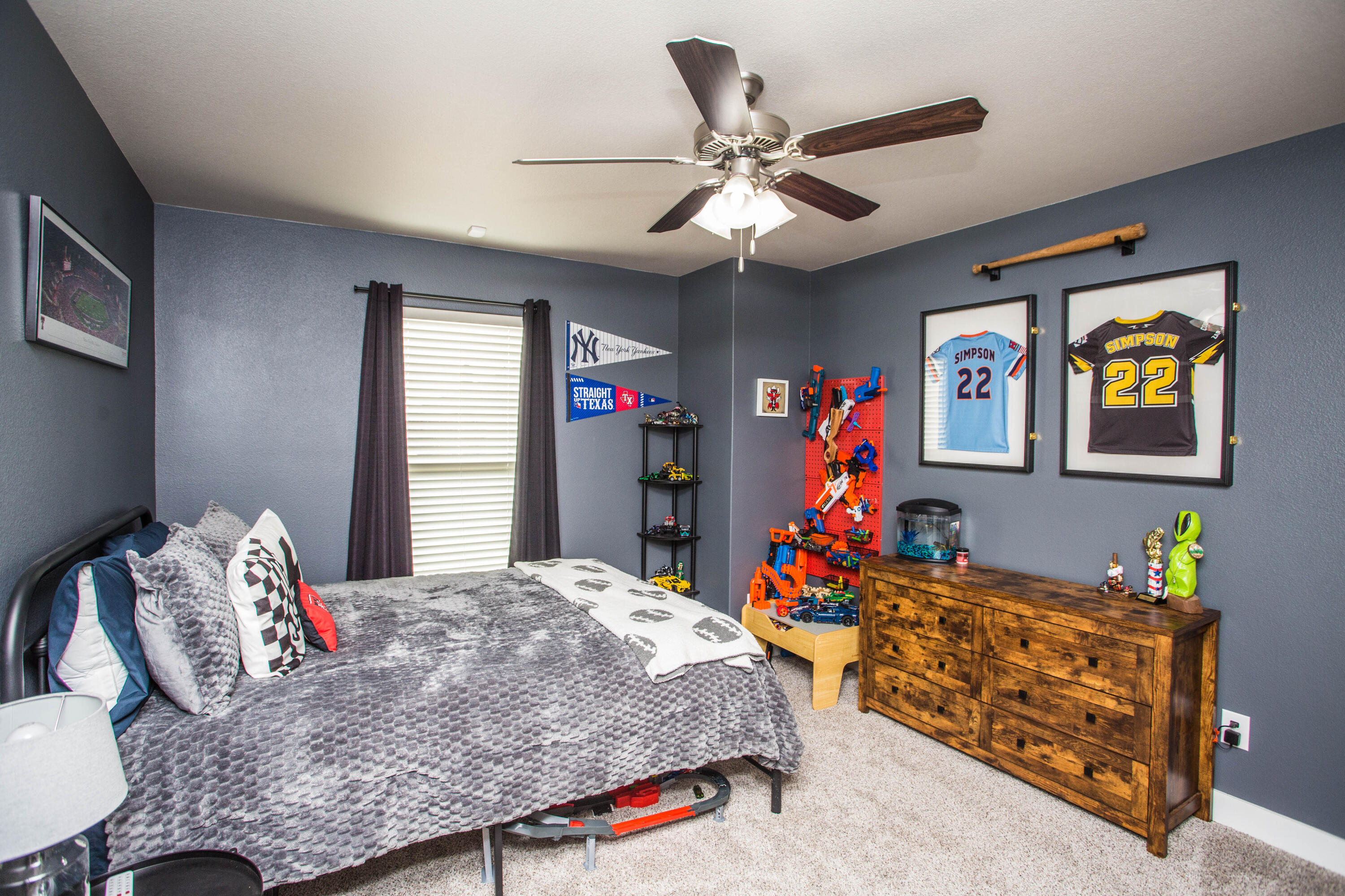 1932 142nd Street Lubbock, TX 79423 - Photo 20 of 38 a bed room with furniture and window