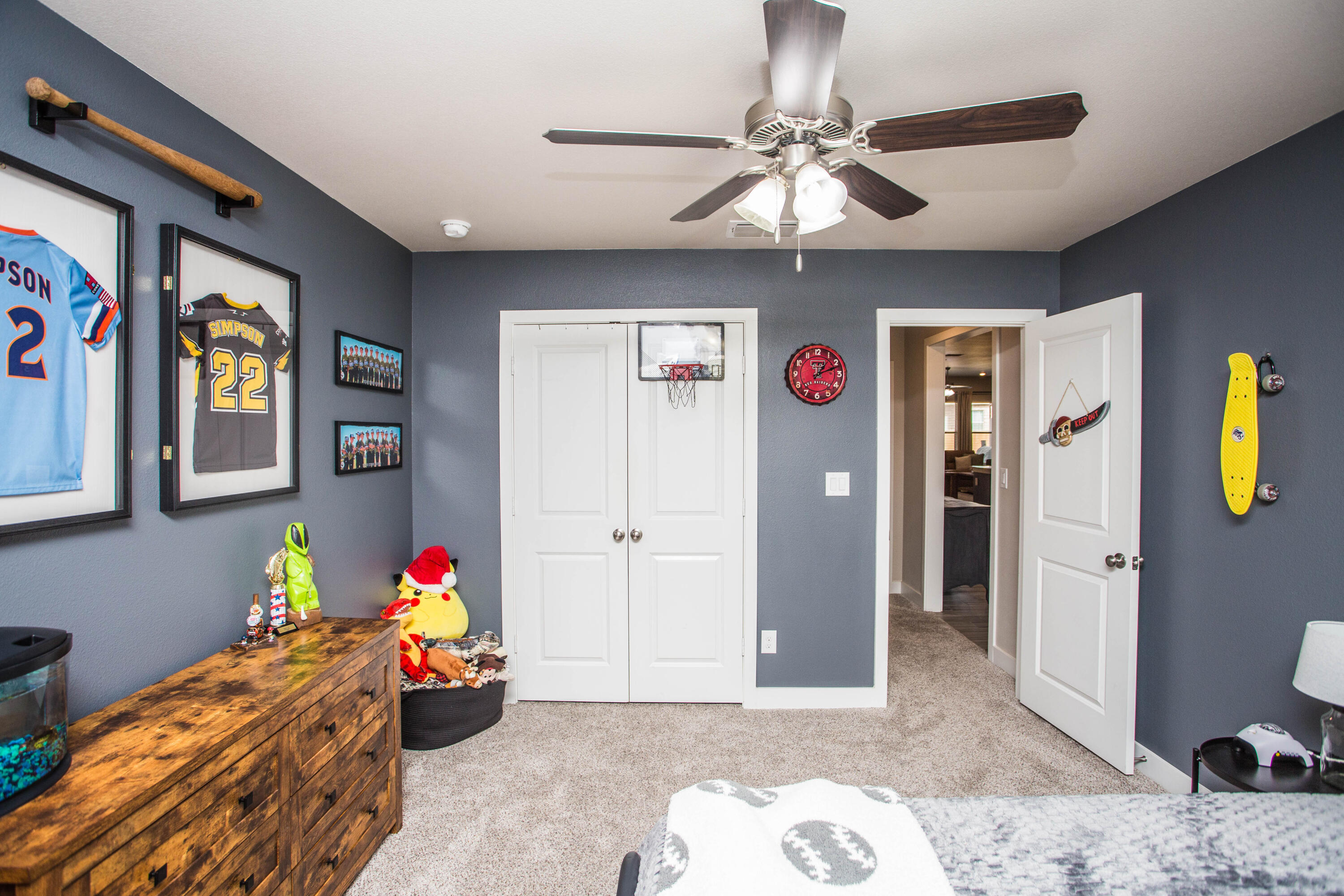 1932 142nd Street Lubbock, TX 79423 - Photo 22 of 38 a bedroom with a bed and furniture