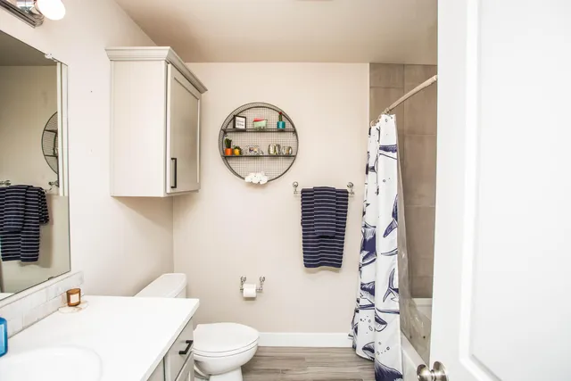 a bathroom with a toilet and a sink