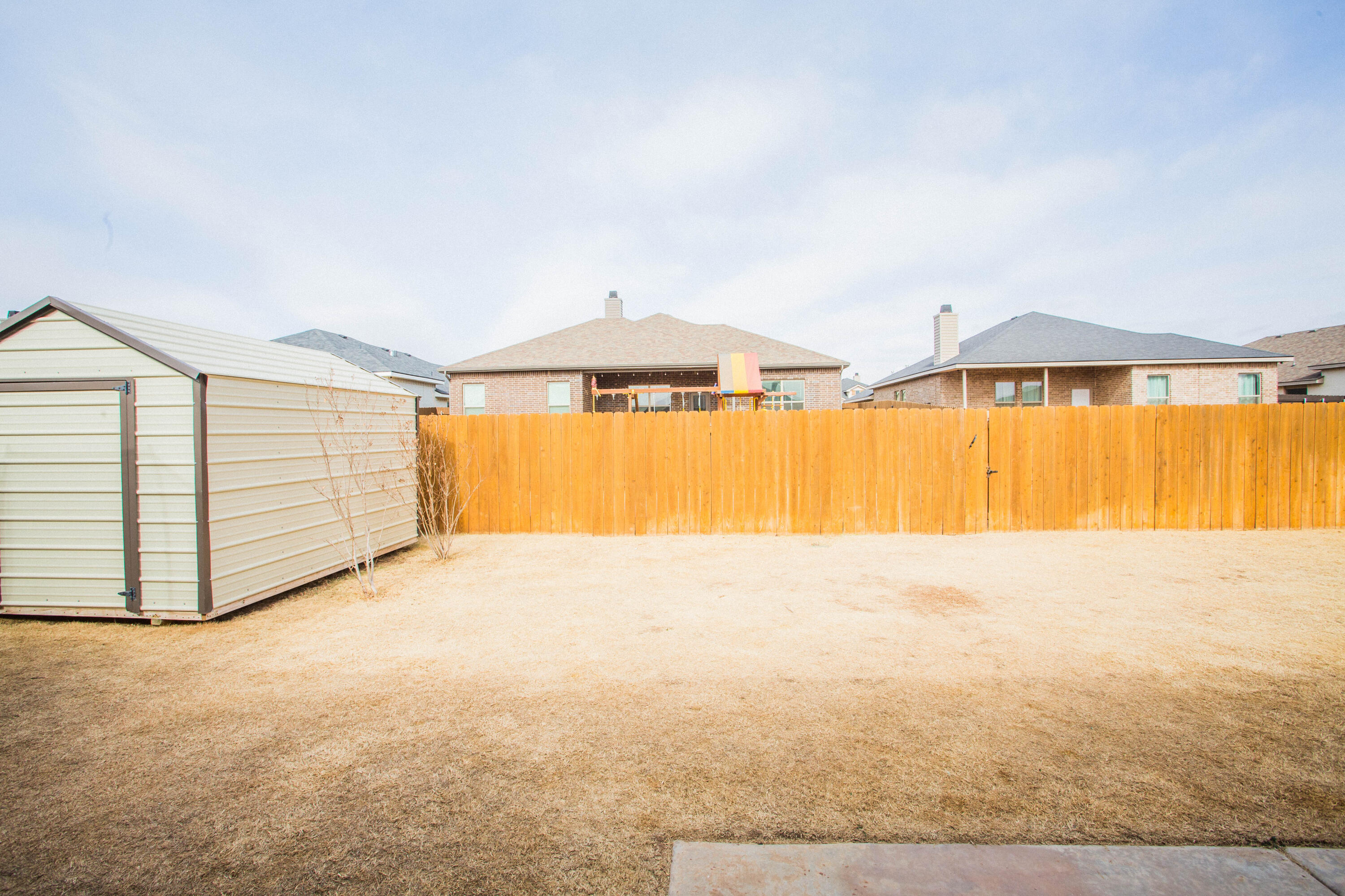1932 142nd Street Lubbock, TX 79423 - Photo 37 of 38 a view of an empty room and window