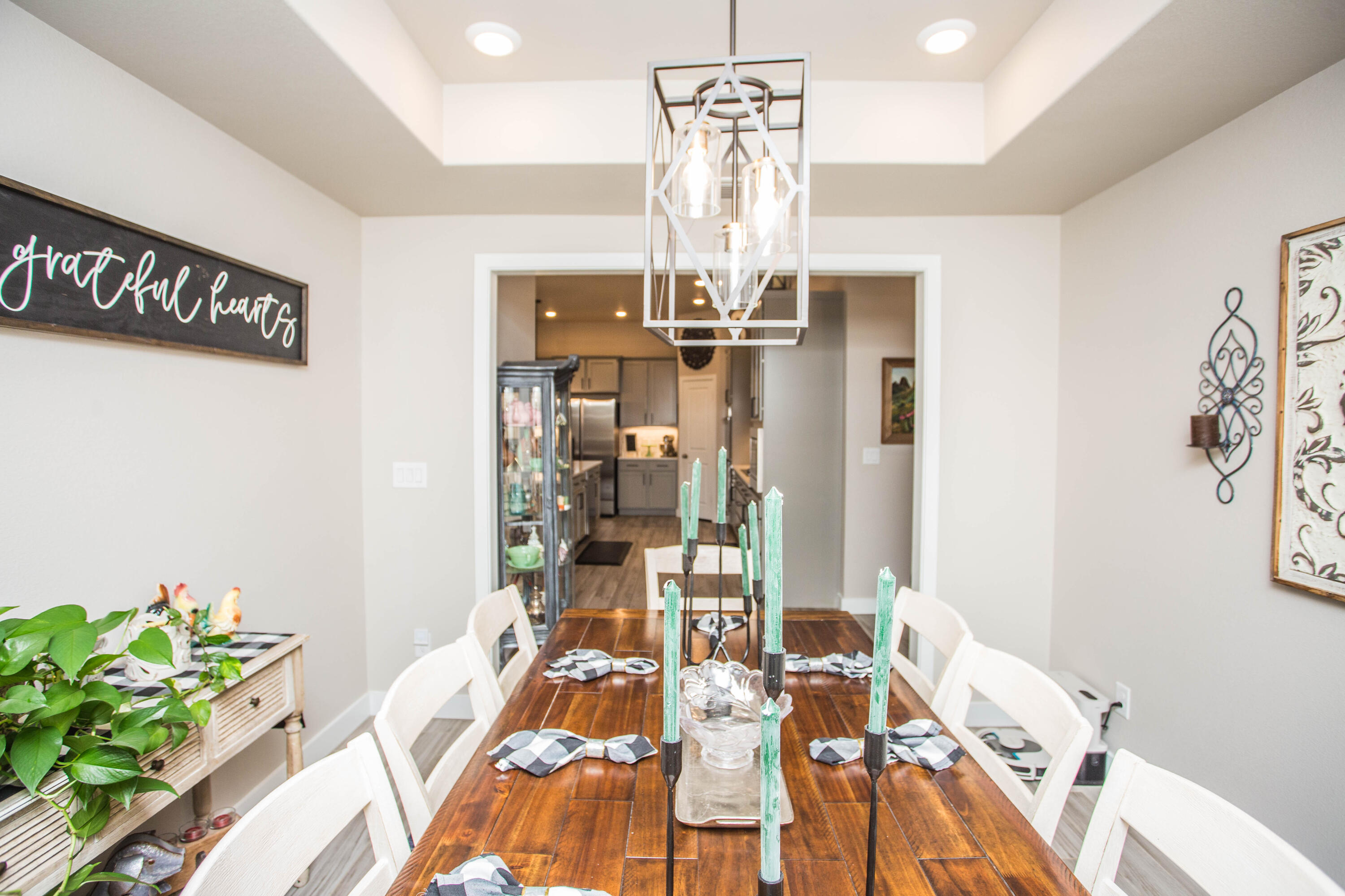 1932 142nd Street Lubbock, TX 79423 - Photo 6 of 38 a bed room with a bed and a chandelier