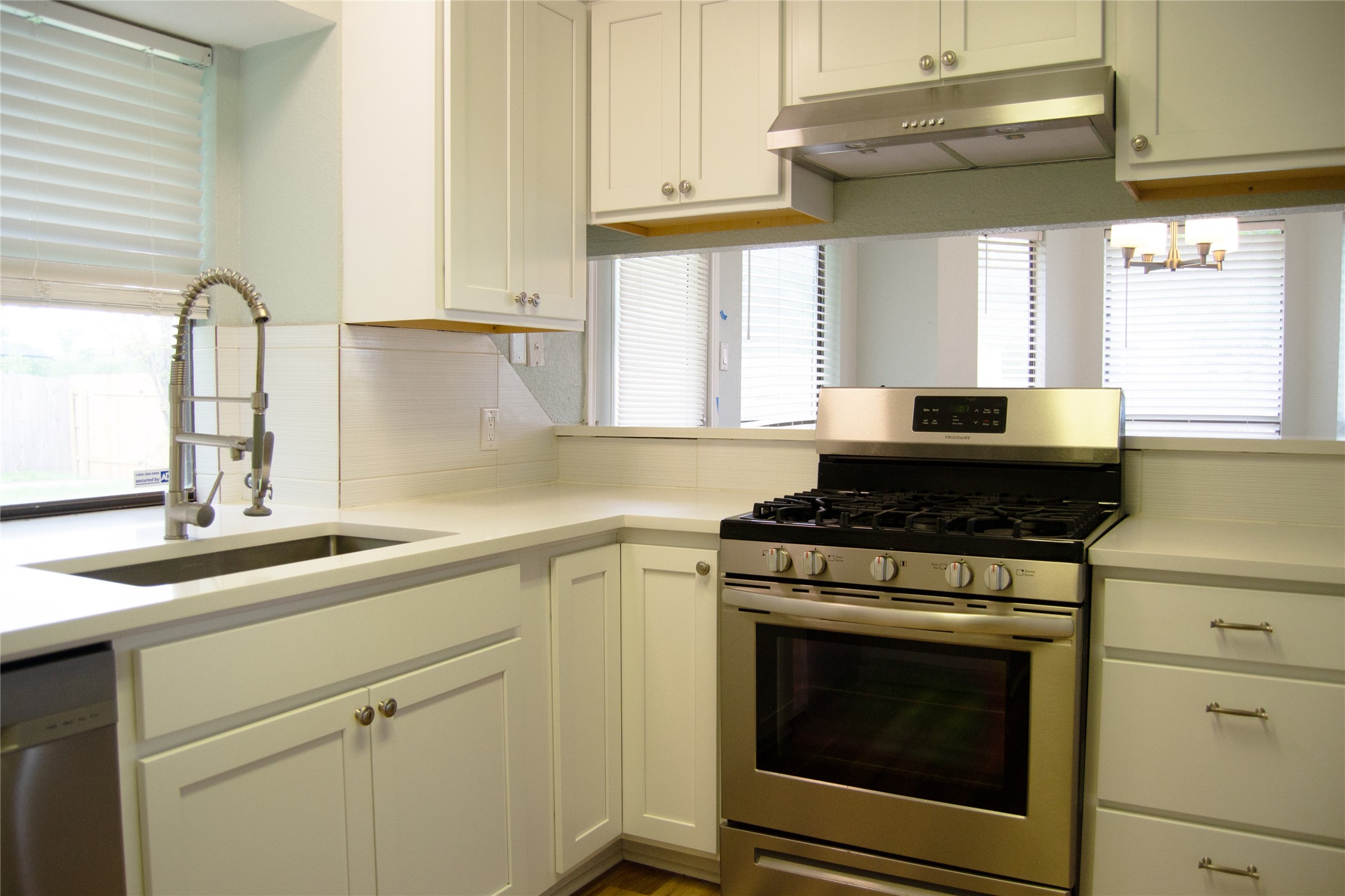 2501 Autrey Drive Leander, TX 78641 - Photo 12 of 27 a kitchen with cabinets and a stove