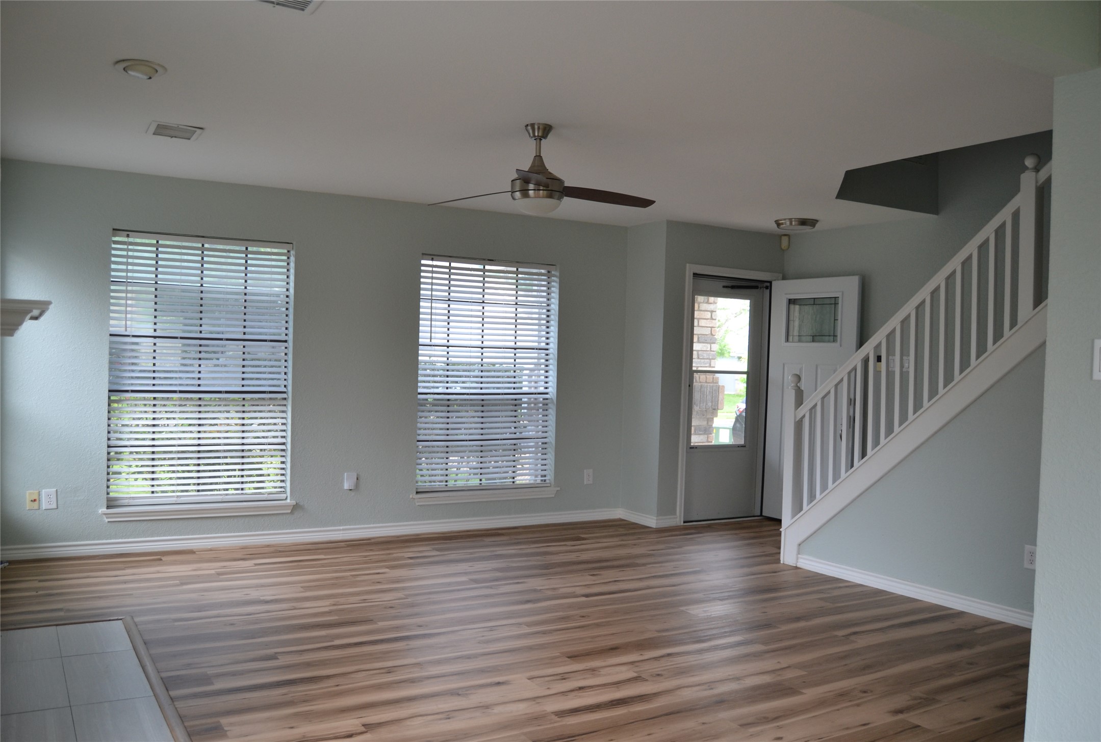 2501 Autrey Drive Leander, TX 78641 - Photo 3 of 27 a view of an empty room with wooden floor and a window