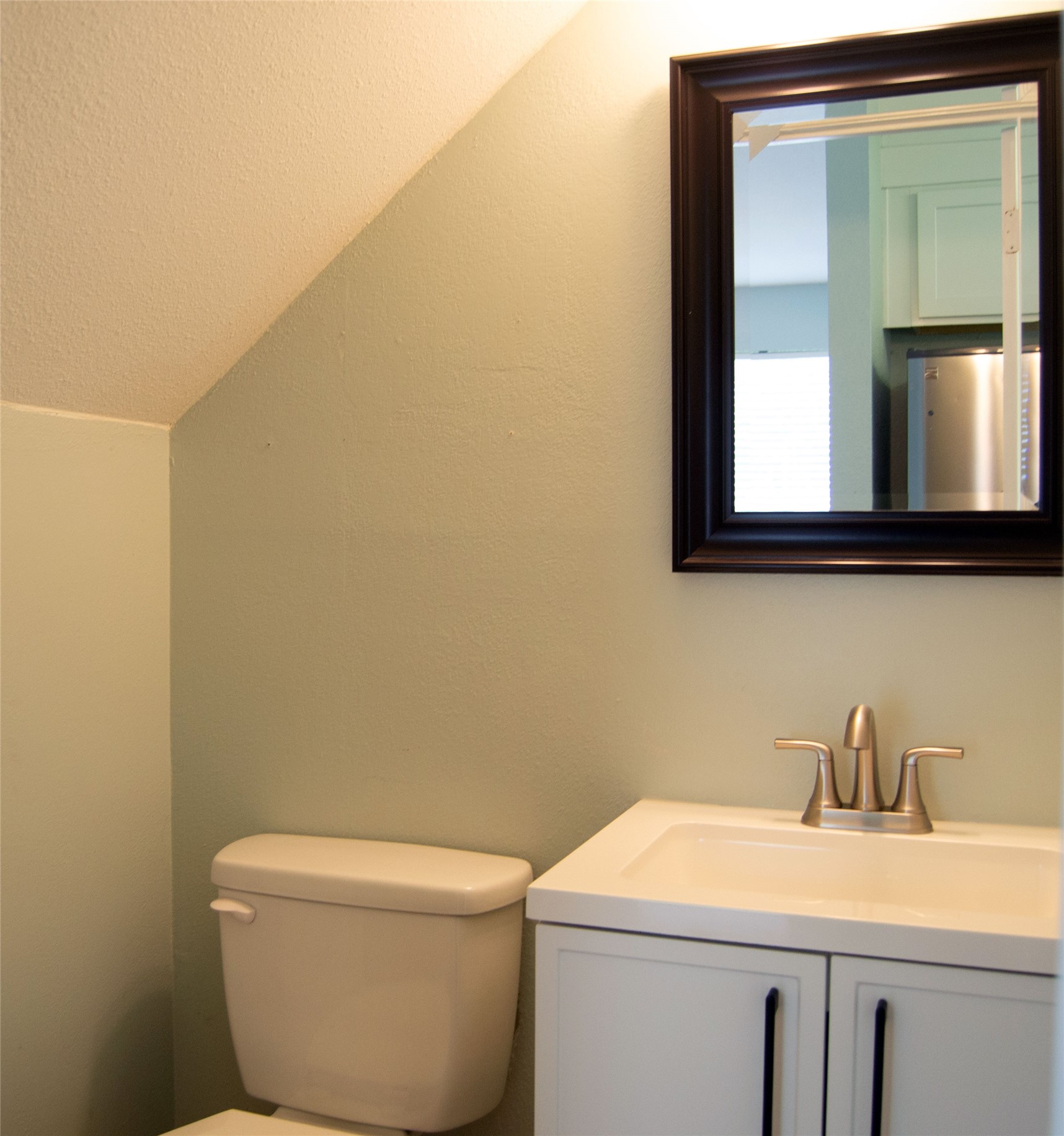 2501 Autrey Drive Leander, TX 78641 - Photo 9 of 27 a bathroom with a toilet sink and mirror