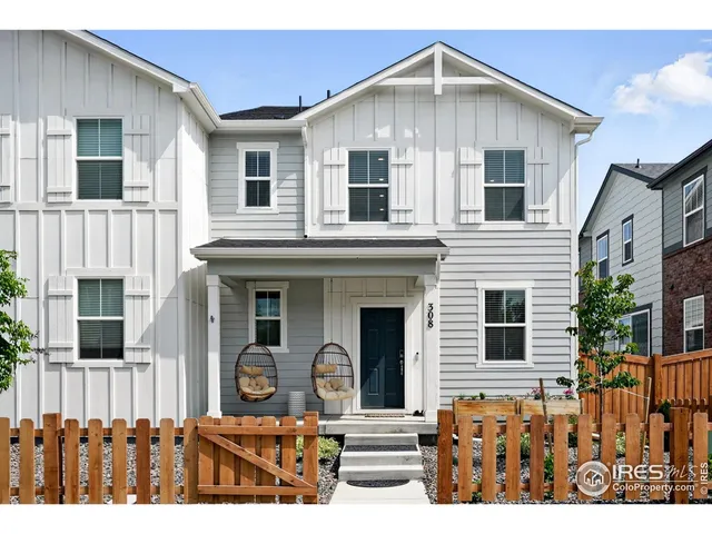 a front view of a house with glass windows