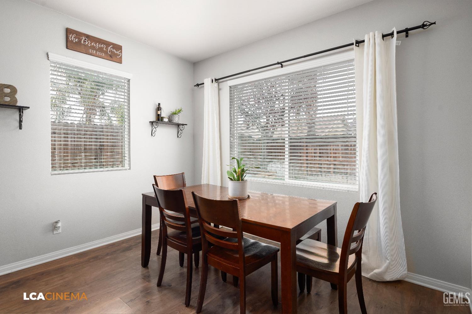 Undisclosed Address Bakersfield, CA 93313 - Photo 13 of 28 a dining room with furniture and window