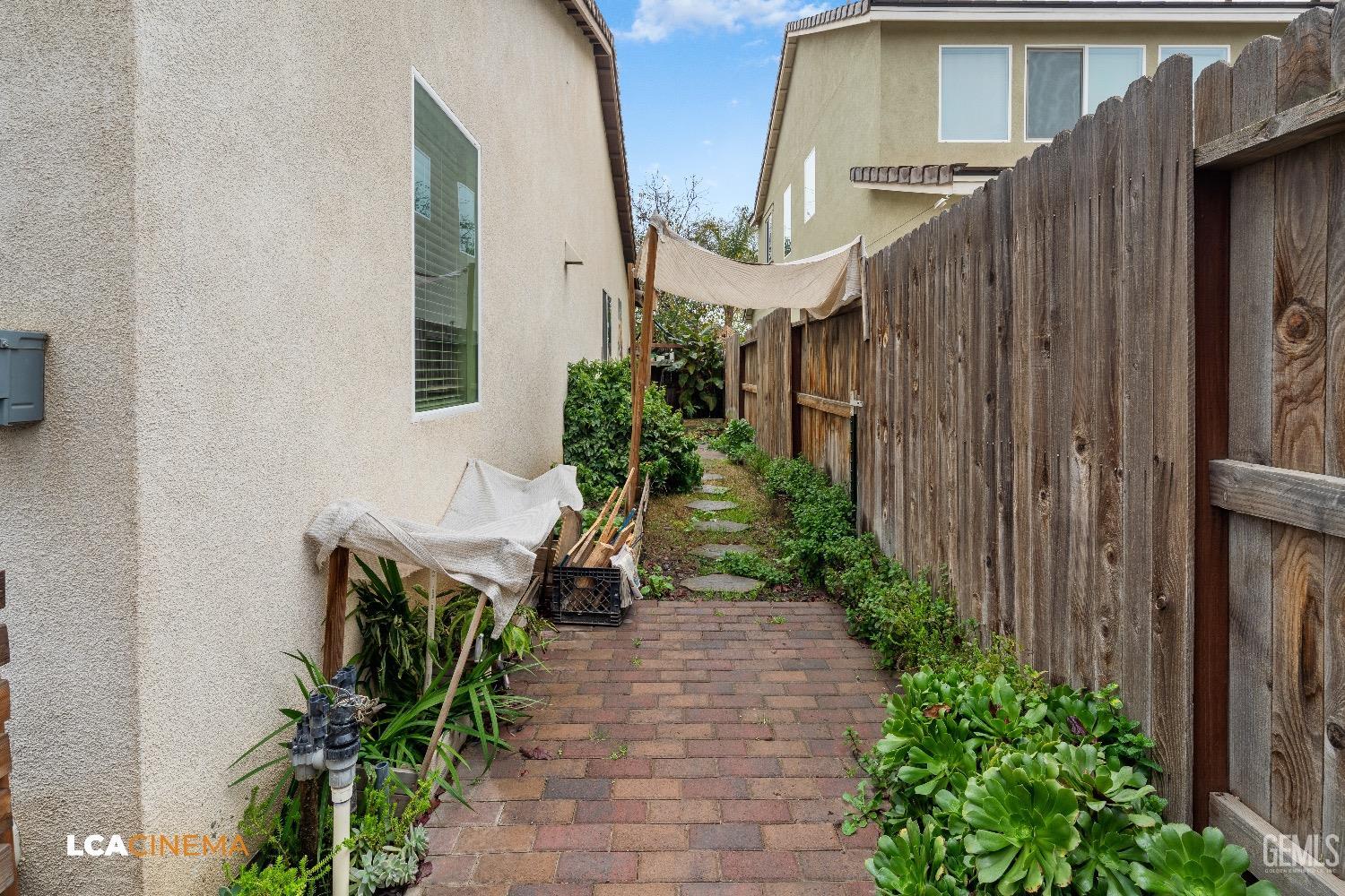 Undisclosed Address Bakersfield, CA 93313 - Photo 25 of 28 a view of a house with backyard and sitting area