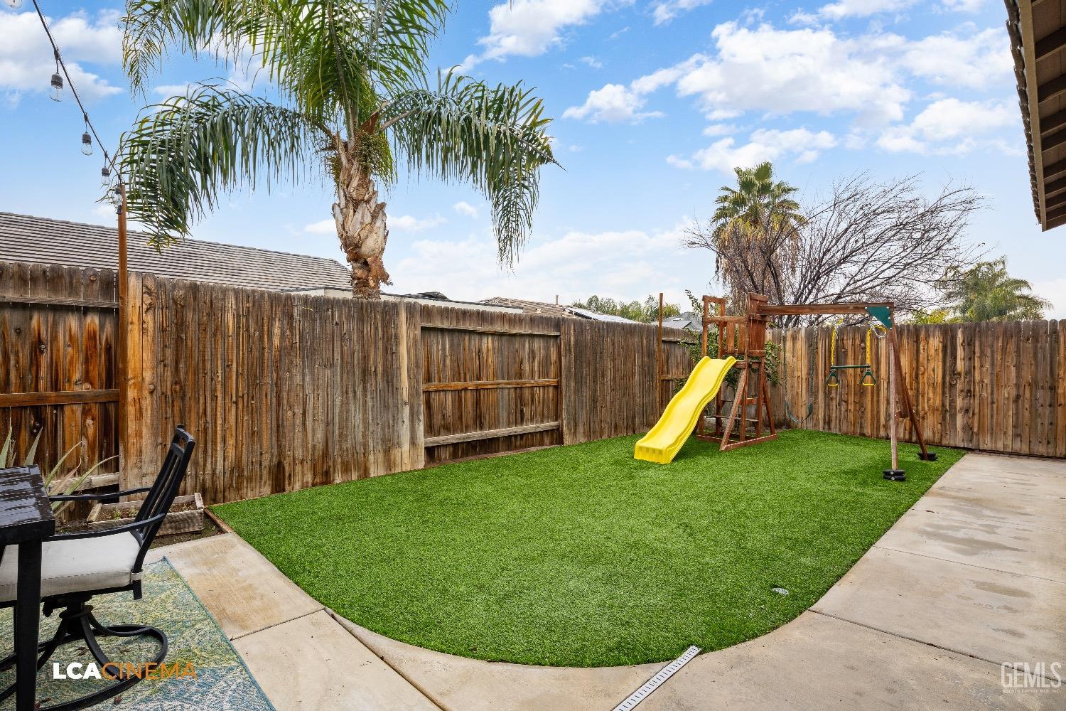 Undisclosed Address Bakersfield, CA 93313 - Photo 28 of 28 a view of a backyard with a slide