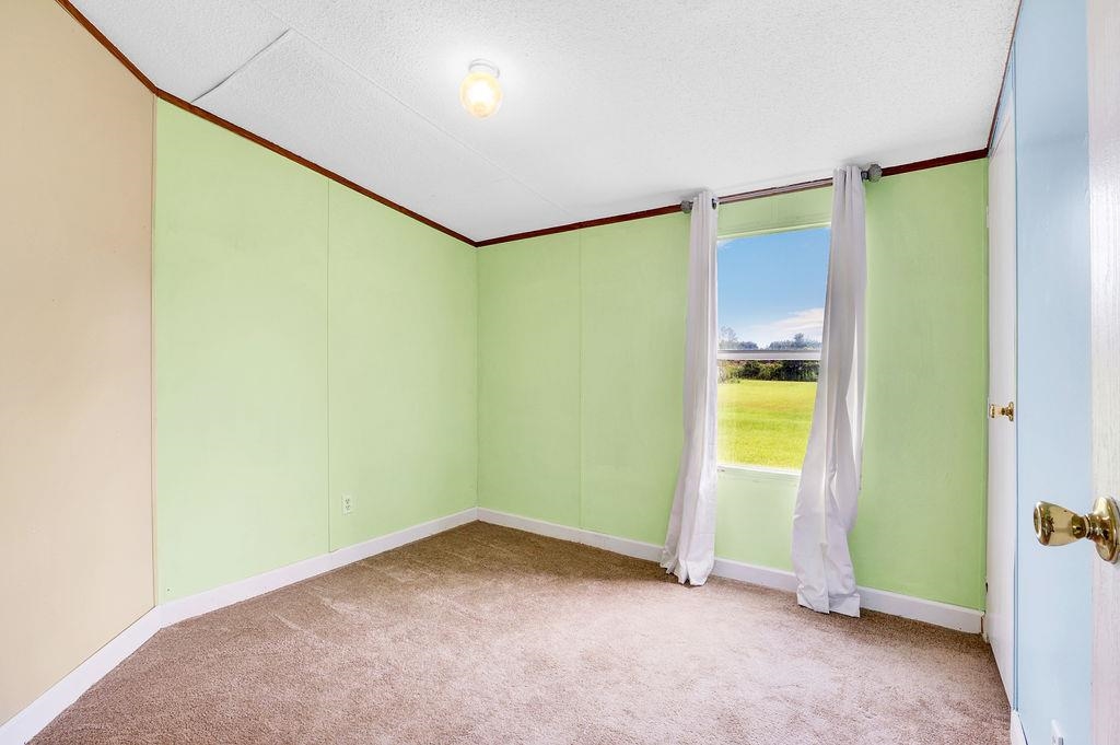 33162 Gilley Road Lillian, AL 36549 - Photo 11 of 19 Guest Bedroom 1