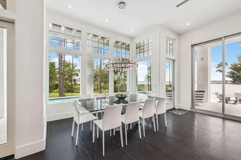 a view of a room that has a bed and a window