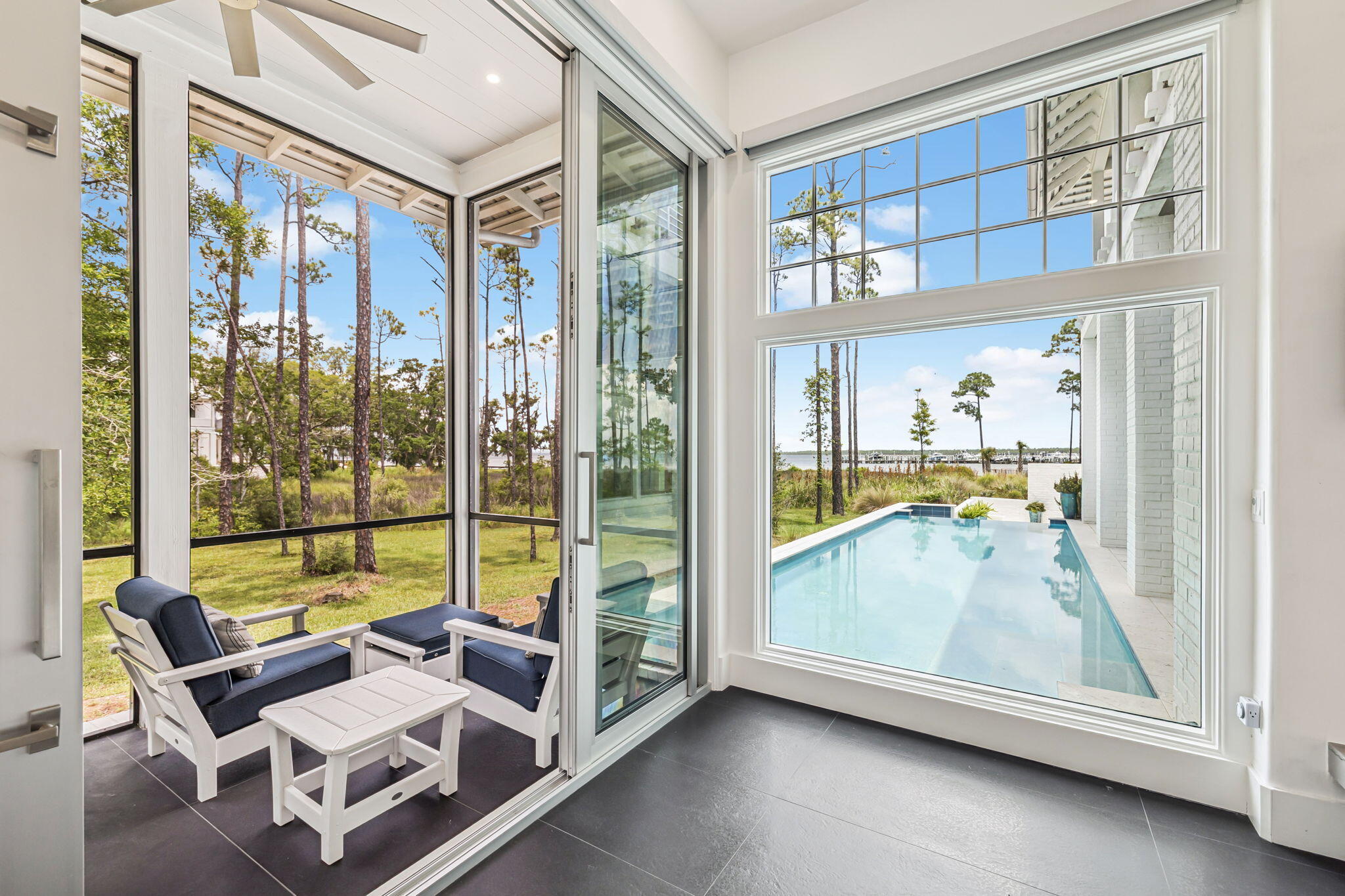 15 Parish Santa Rosa Beach, FL 32459 - Photo 33 of 122 a living room with furniture and a floor to ceiling window