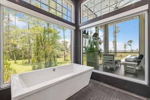 a view of residential houses with outdoor space and swimming pool