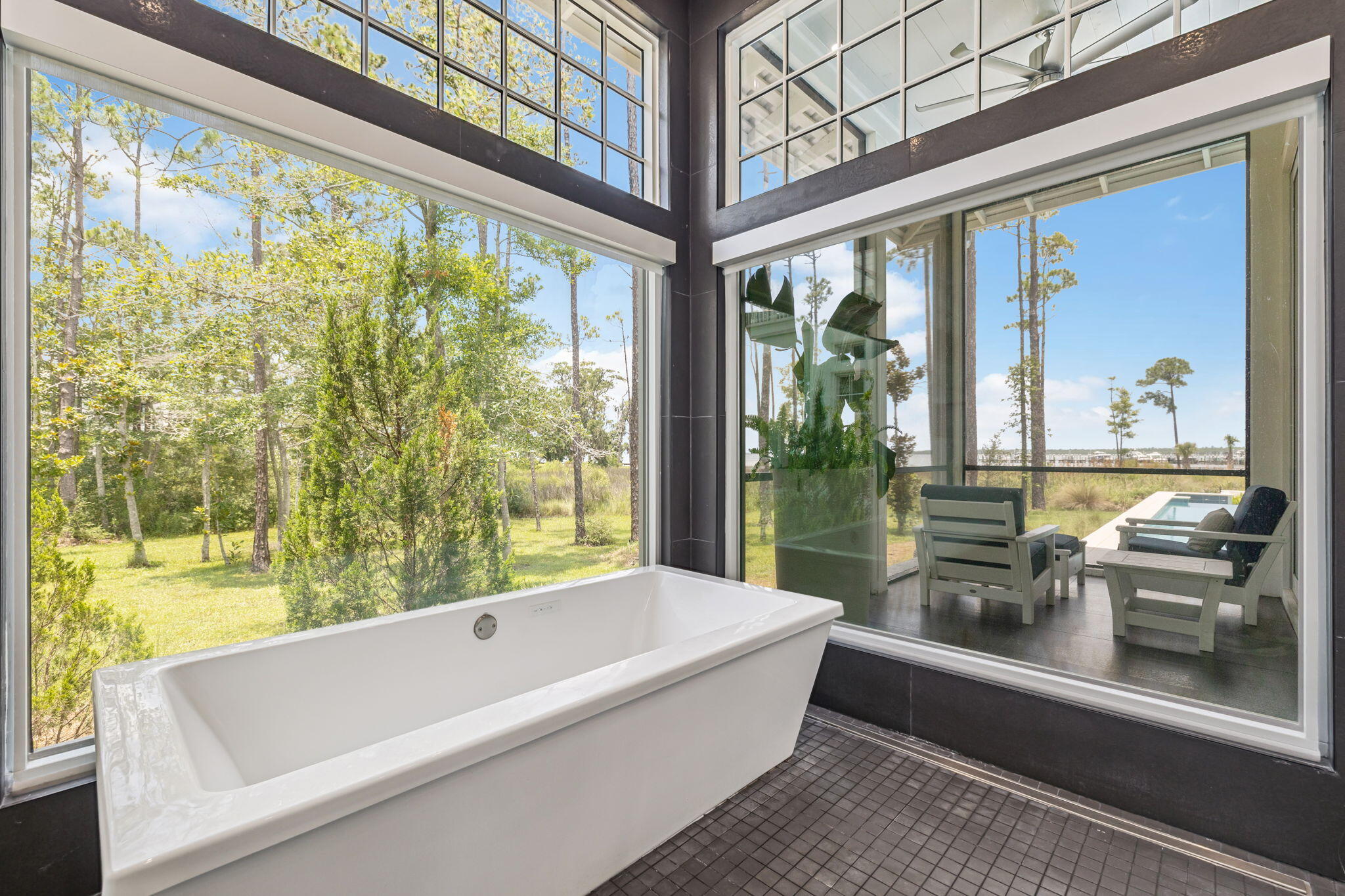 15 Parish Santa Rosa Beach, FL 32459 - Photo 42 of 122 a bathroom with a large window and a bathtub in a balcony