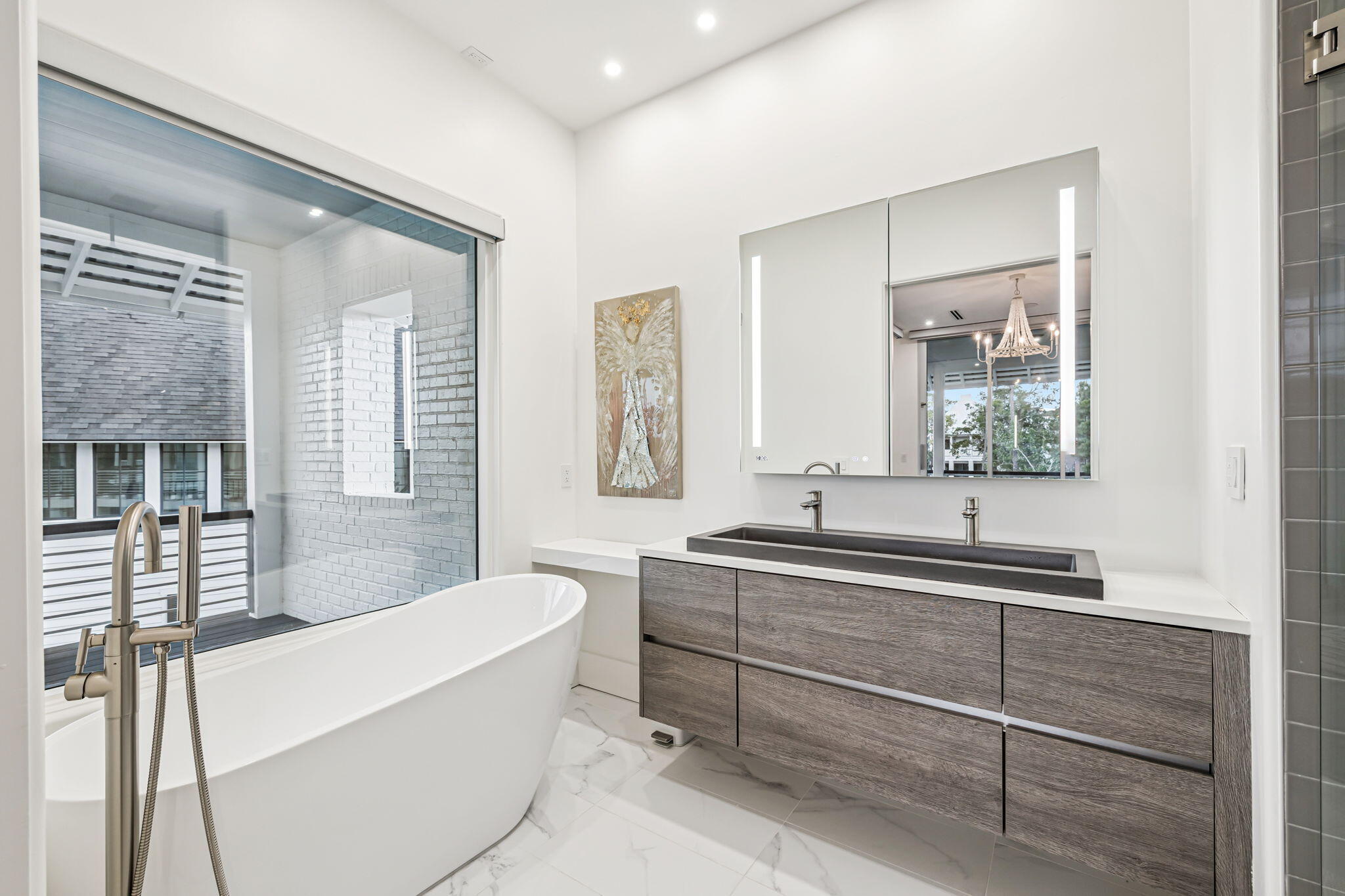 15 Parish Santa Rosa Beach, FL 32459 - Photo 54 of 122 a bathroom with a tub sink and mirror