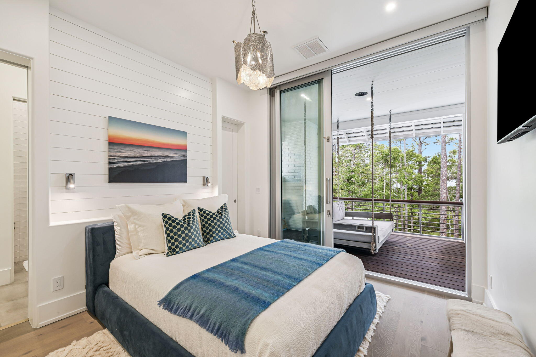 15 Parish Santa Rosa Beach, FL 32459 - Photo 57 of 122 a bedroom with a large bed and a flat tv screen