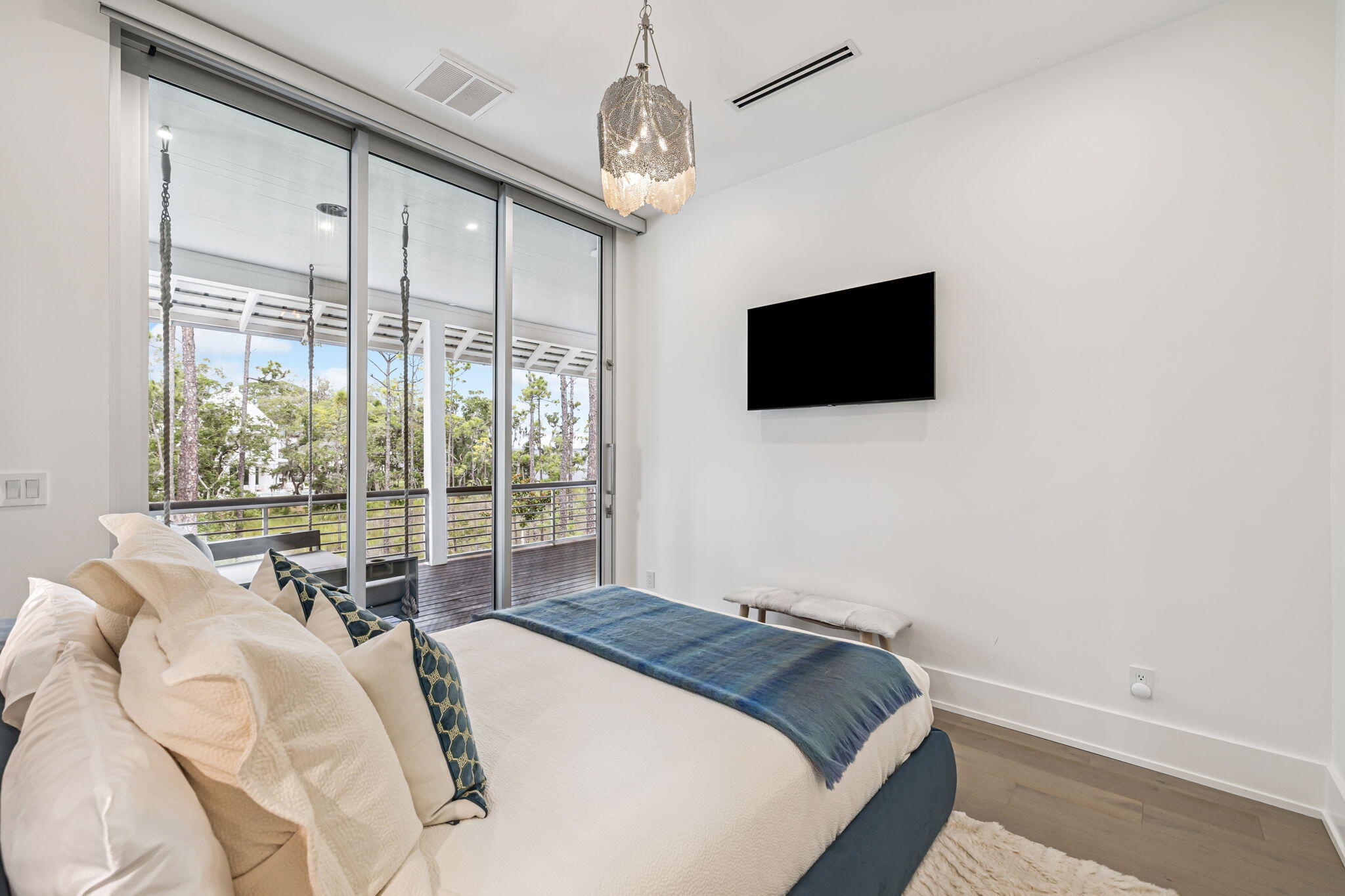 15 Parish Santa Rosa Beach, FL 32459 - Photo 58 of 122 a bedroom with a bed and a flat screen tv