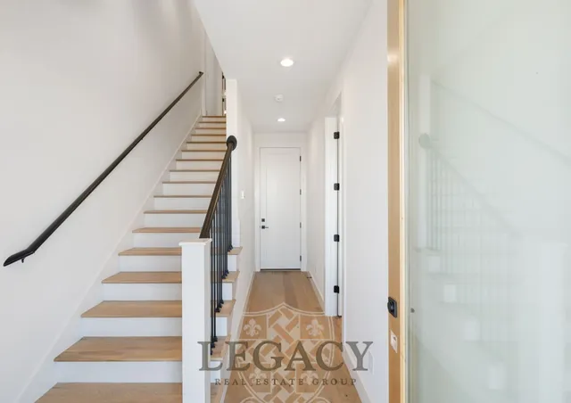 a view of entryway with wooden floor
