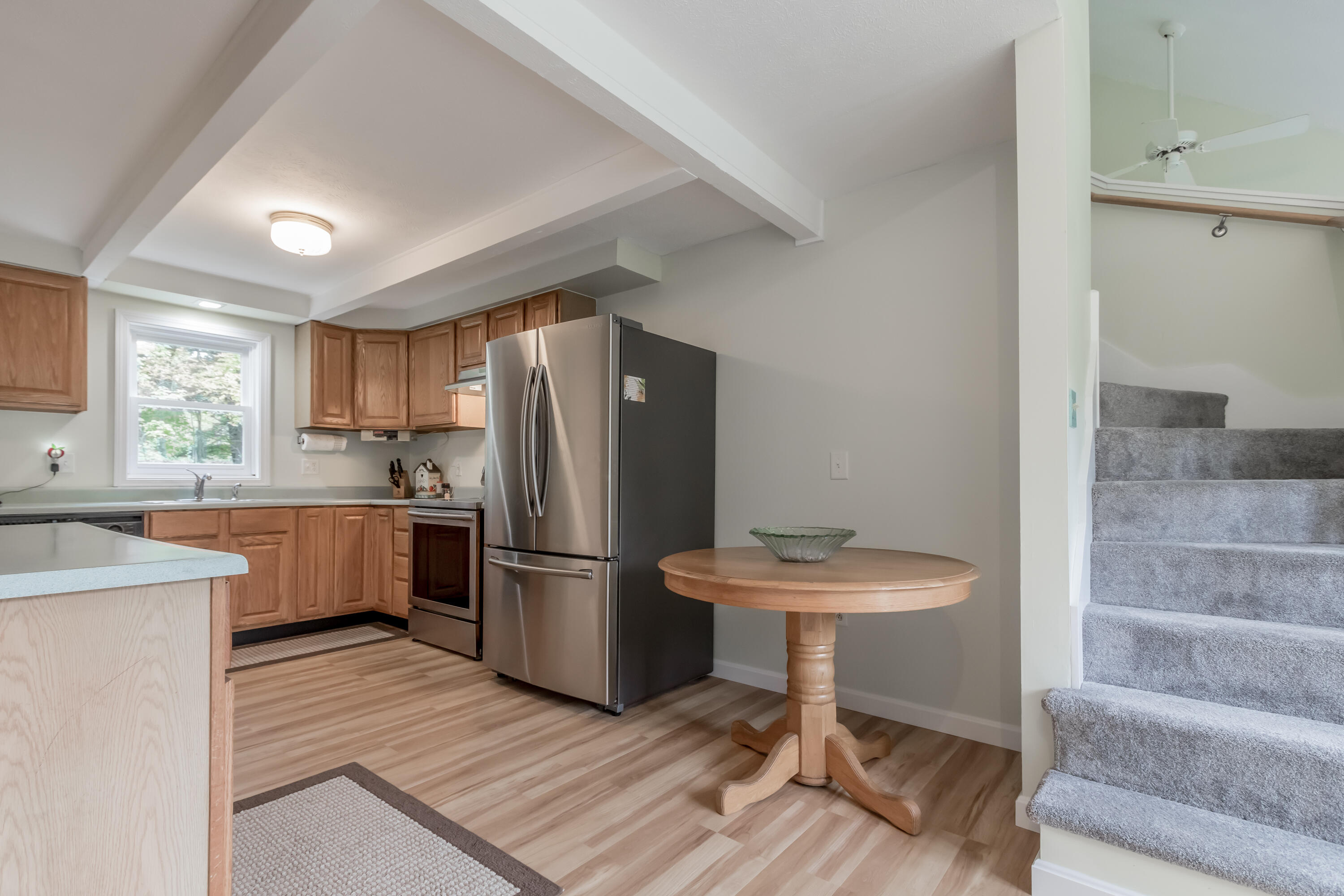 270 Bonny Eagle Road Hollis, ME 04042 - Photo 7 of 48 7 Kitchen and staircase from foyer