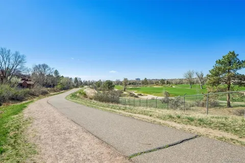 a view of a road with a yard