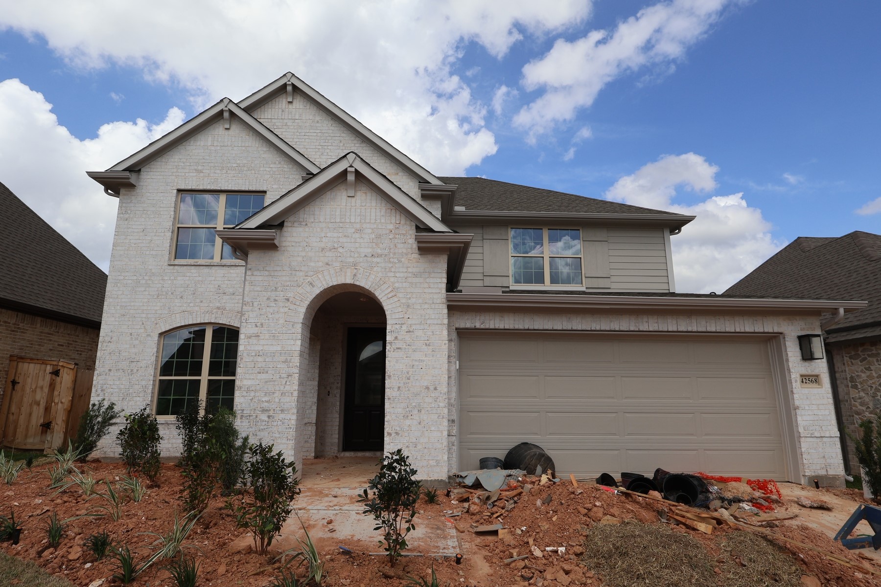 42568 Edmund Rucker Lane Magnolia, TX 77354 - Photo 1 of 18 a front view of a house with garden