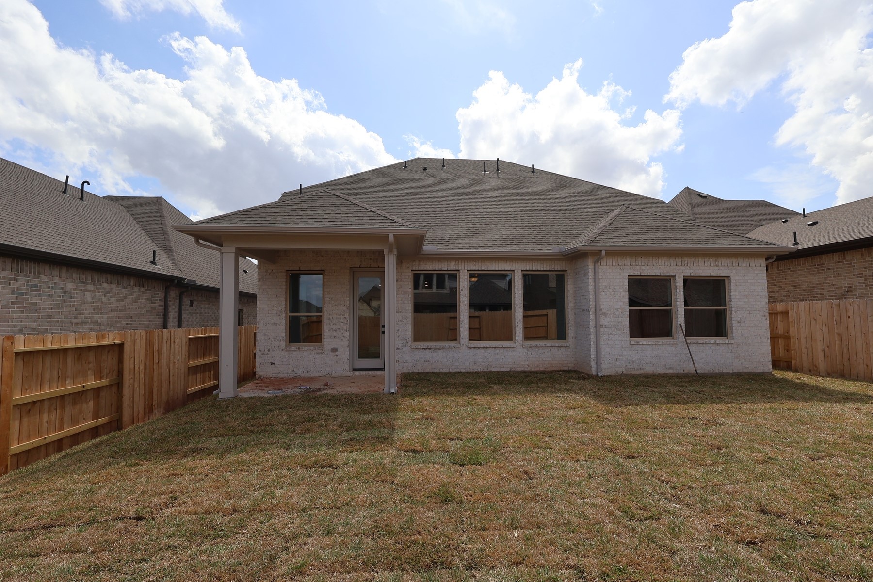 42568 Edmund Rucker Lane Magnolia, TX 77354 - Photo 2 of 18 a view of a house with a garden