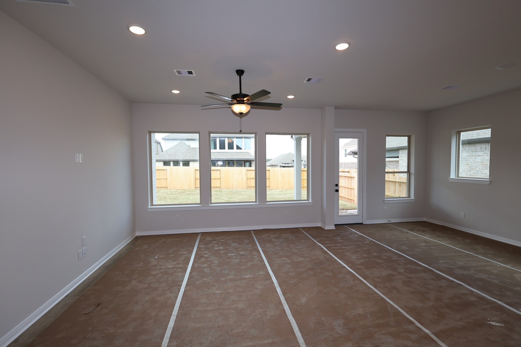 42568 Edmund Rucker Lane Magnolia, TX 77354 - Photo 6 of 18 a view of an empty room with a window