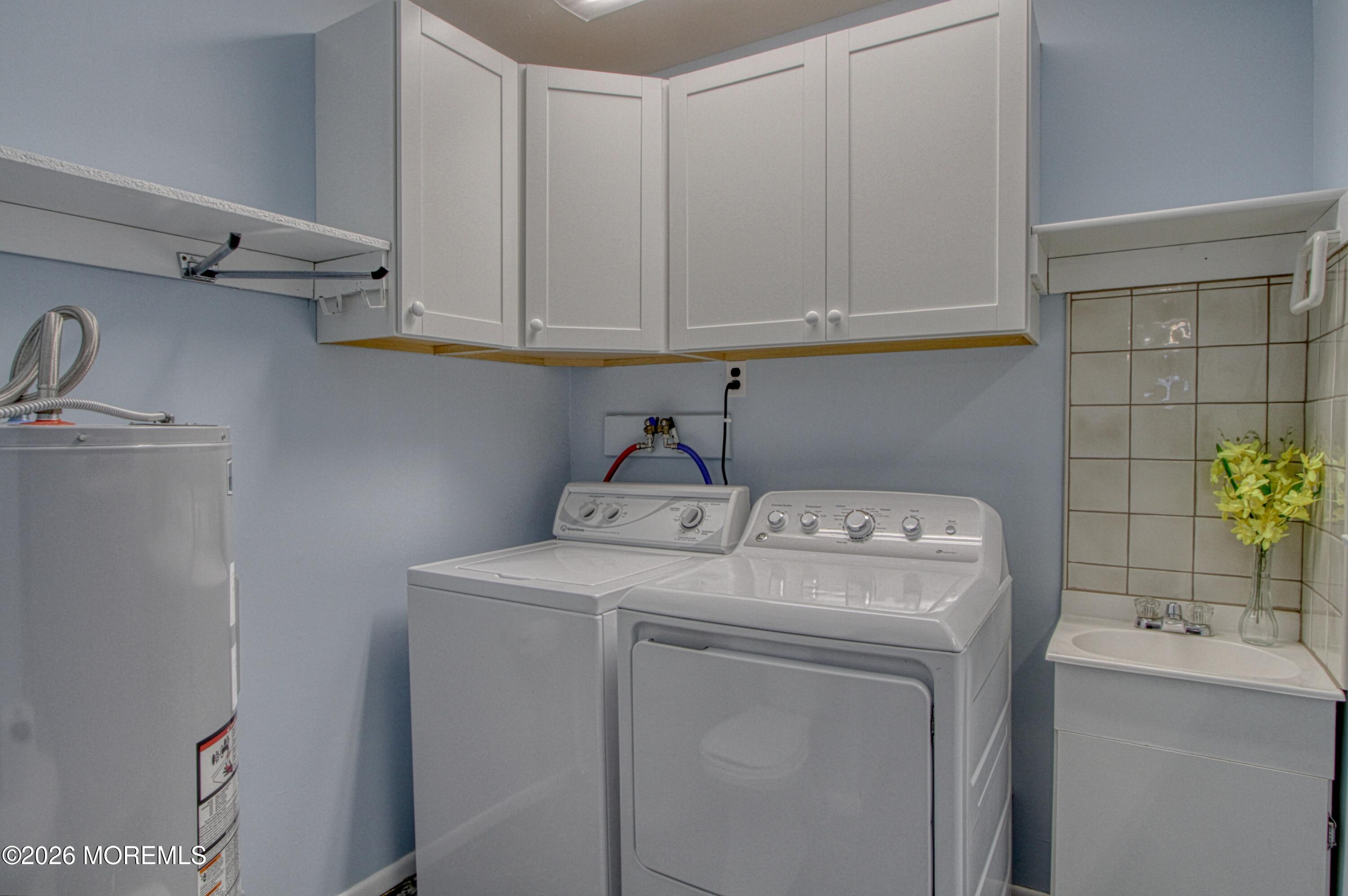 12 Homestead Drive, Unit A Whiting, NJ 08759 - Photo 15 of 18 a utility room with dryer and washer