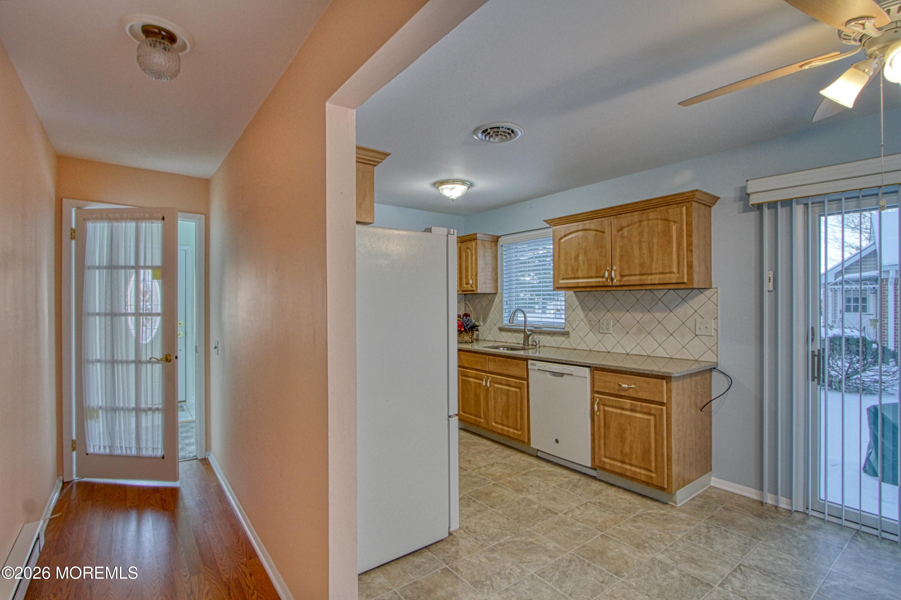 12 Homestead Drive, Unit A Whiting, NJ 08759 - Photo 4 of 18 a kitchen with stainless steel appliances granite countertop a refrigerator and a sink
