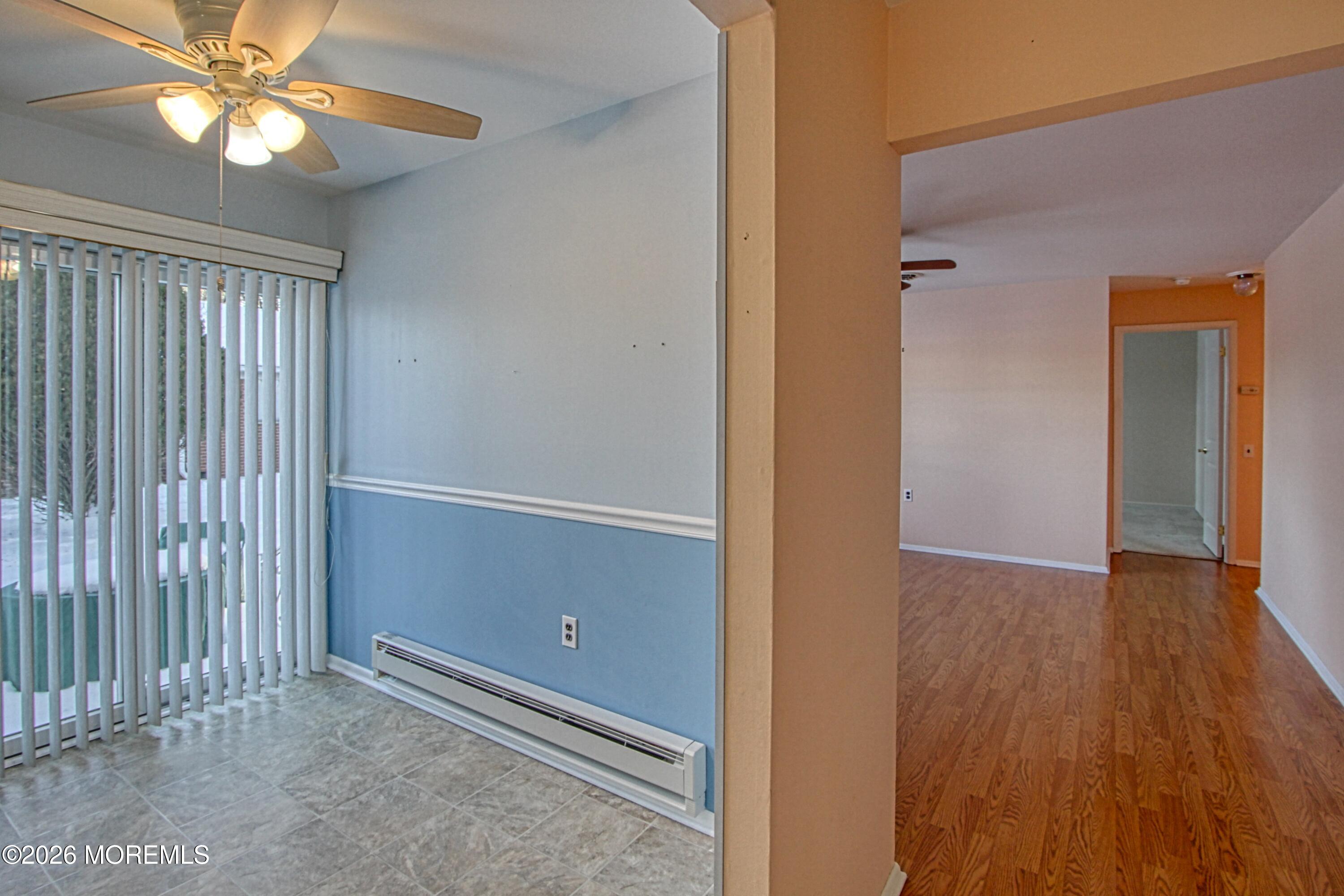 12 Homestead Drive, Unit A Whiting, NJ 08759 - Photo 5 of 18 wooden floor in an empty room with a window