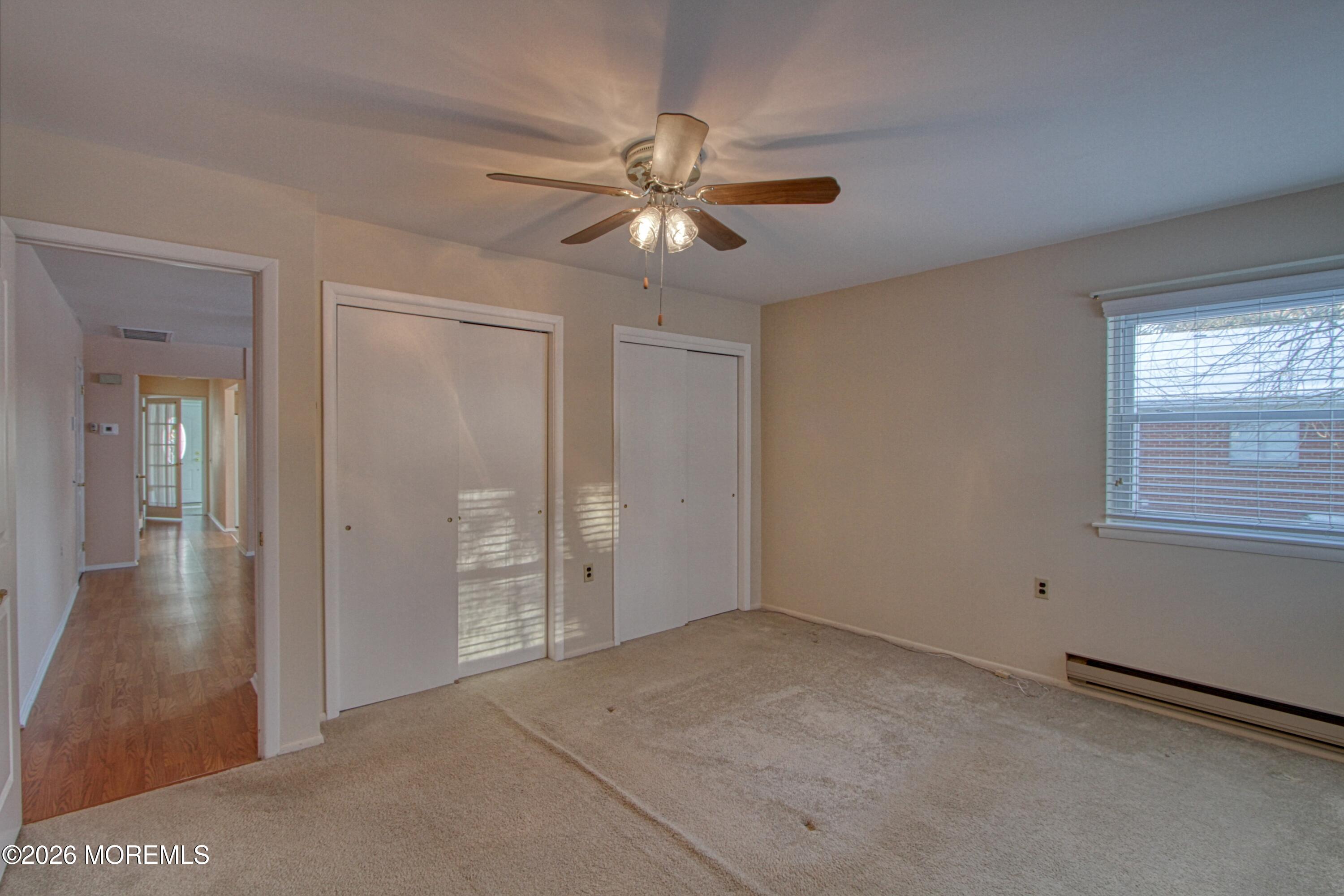 12 Homestead Drive, Unit A Whiting, NJ 08759 - Photo 8 of 18 a view of an empty room with a window
