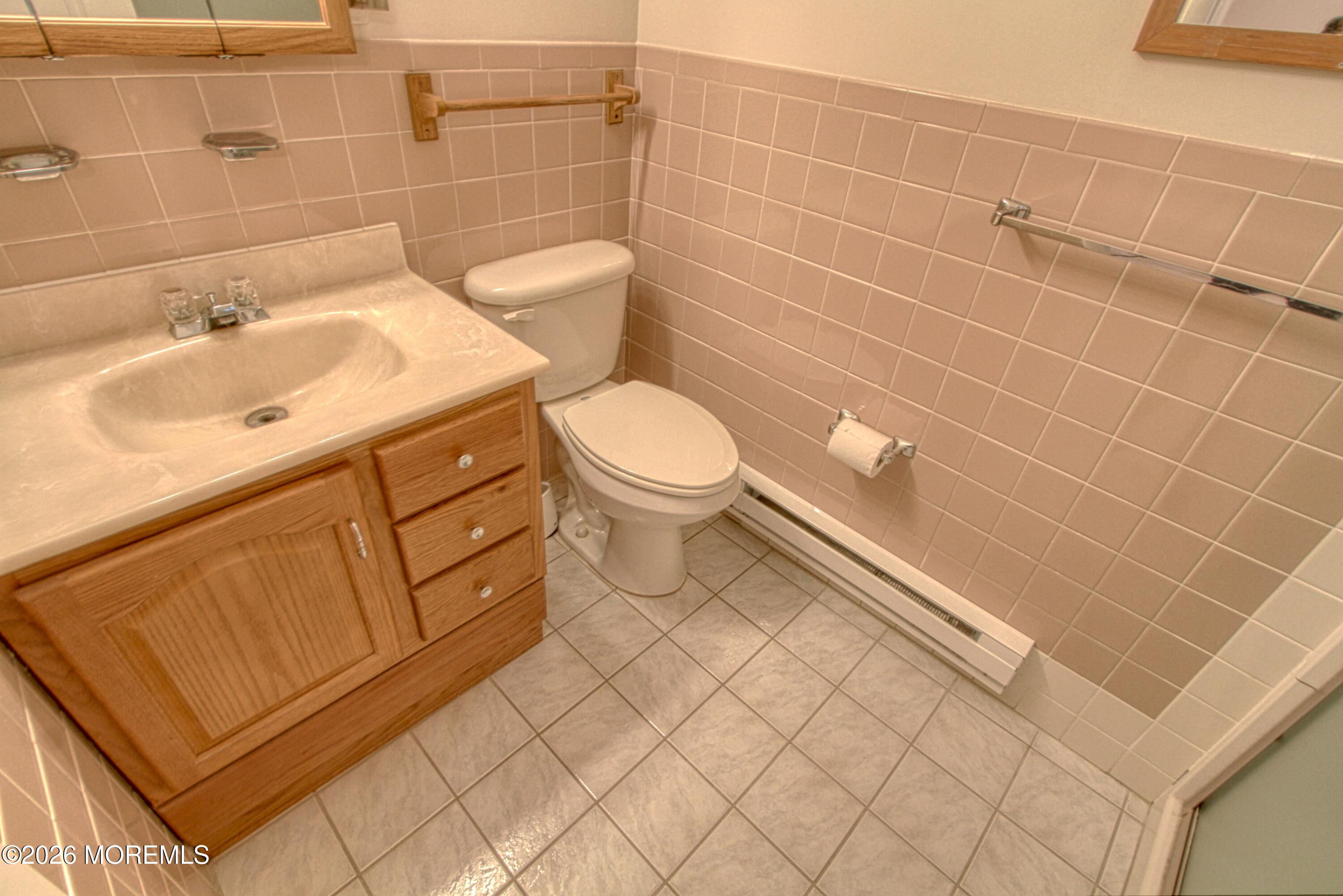12 Homestead Drive, Unit A Whiting, NJ 08759 - Photo 10 of 18 a bathroom with a sink and a toilet
