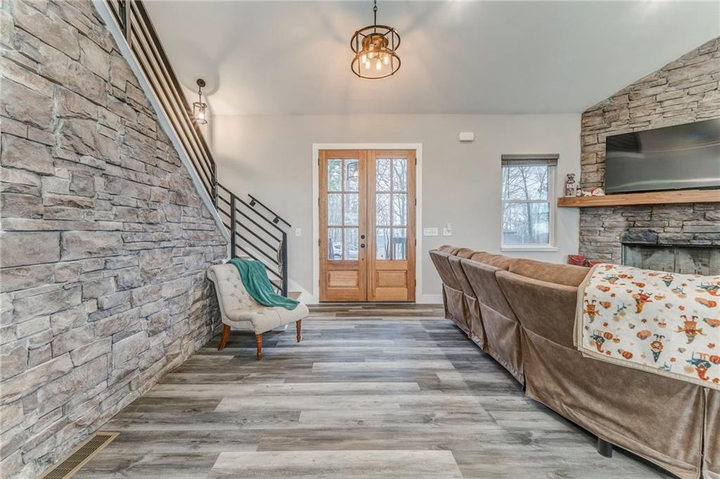 1172 Hunter Drive Ranger, GA 30734 - Photo 14 of 78 a living room with furniture and a flat screen tv