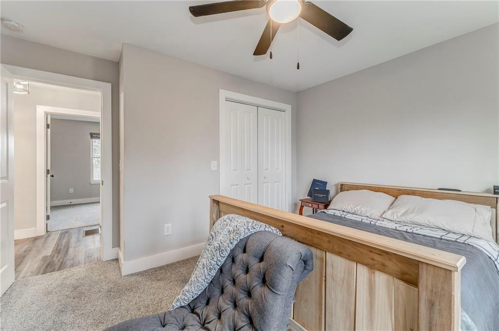 1172 Hunter Drive Ranger, GA 30734 - Photo 48 of 78 a bedroom with a bed and a window