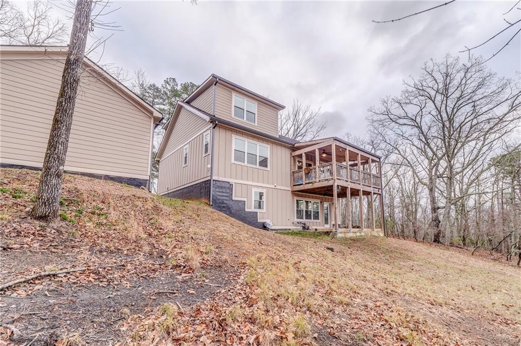 1172 Hunter Drive Ranger, GA 30734 - Photo 72 of 78 a view of a house with a snow in the yard