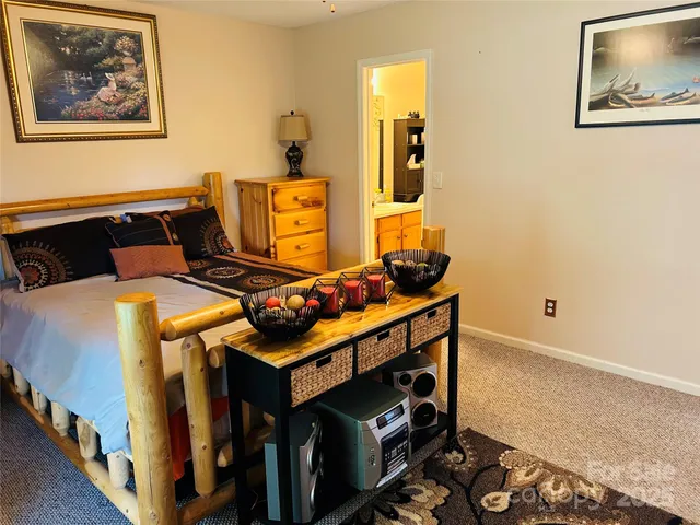 a bathroom with a sink vanity mirror and toilet