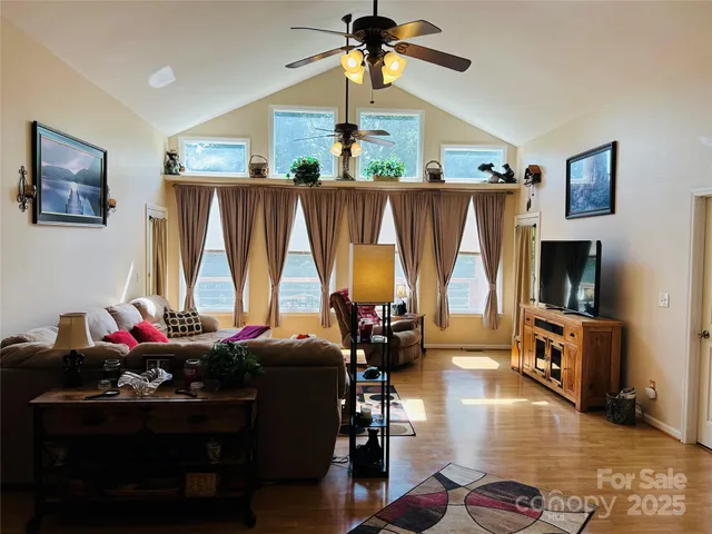 a room with furniture and a flat screen tv