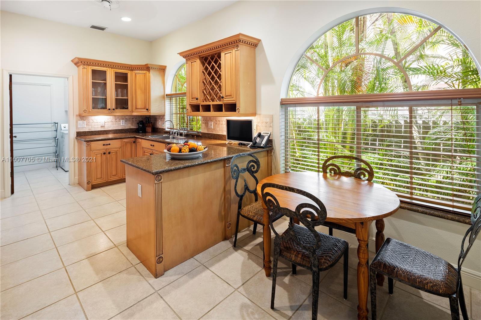 1385 North Biscayne Point Road Miami Beach, FL 33141 - Photo 12 of 68 a view of a dining room with furniture window and outside view