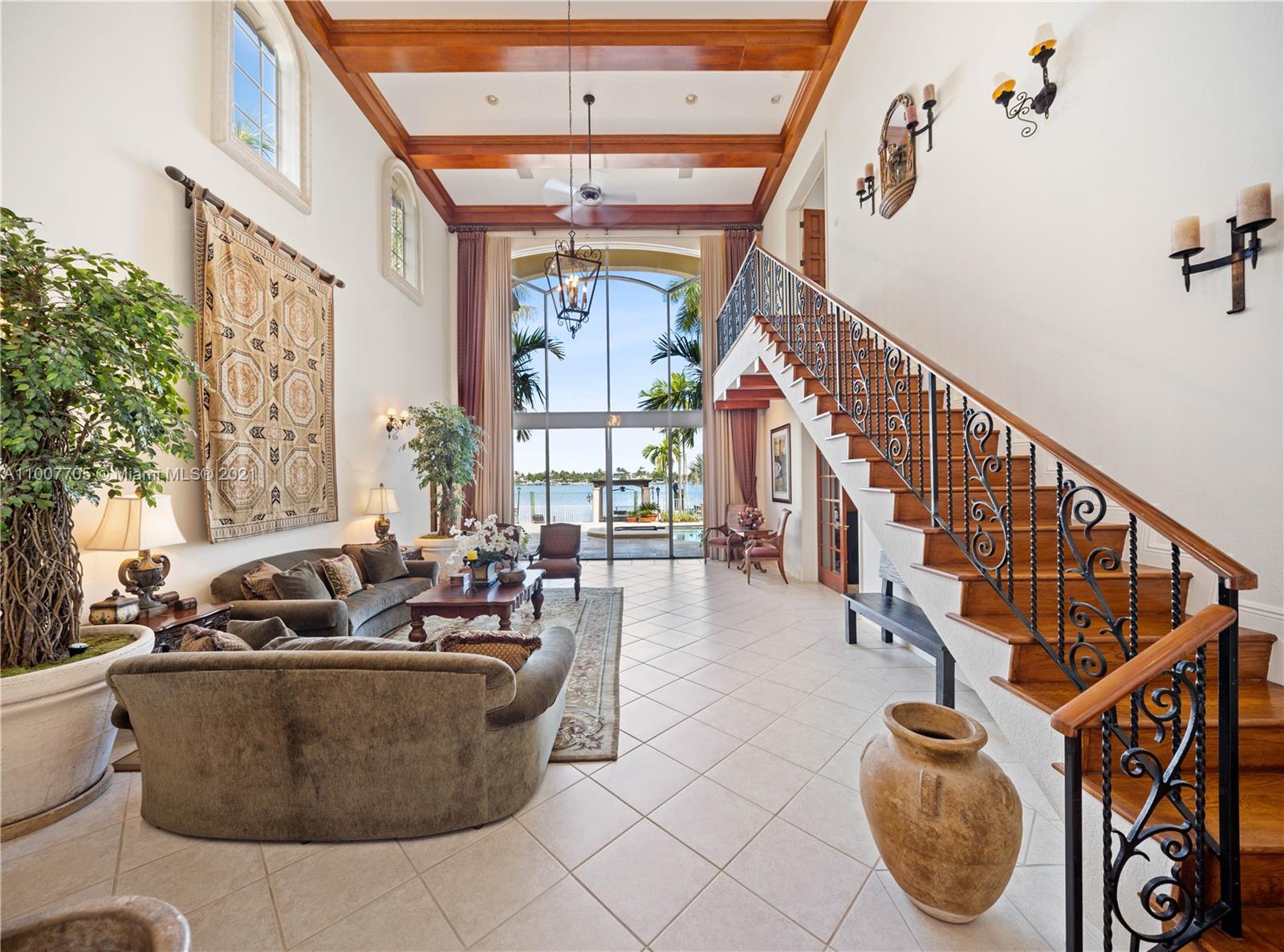 1385 North Biscayne Point Road Miami Beach, FL 33141 - Photo 14 of 68 a living room with furniture and a potted plant