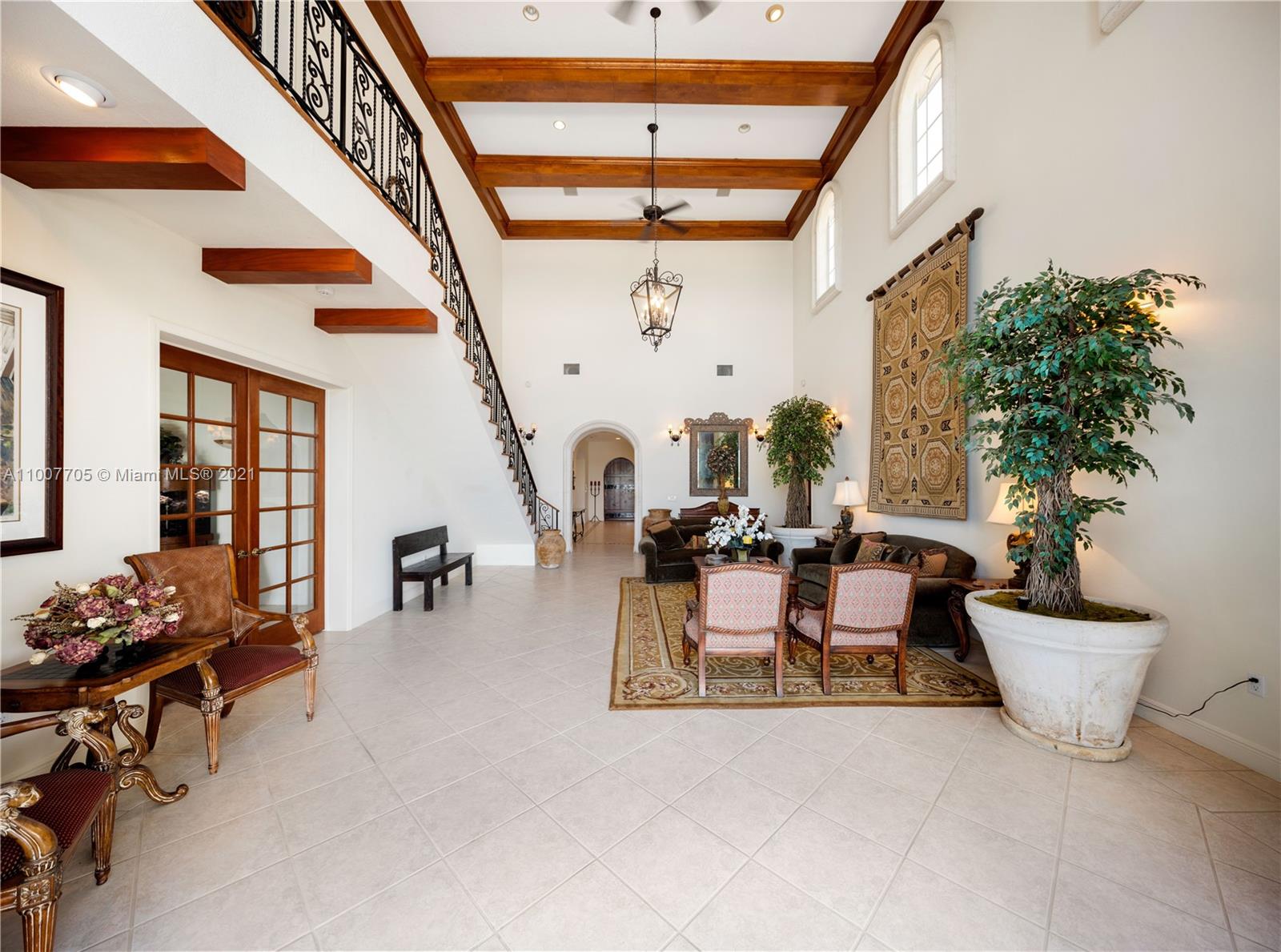 1385 North Biscayne Point Road Miami Beach, FL 33141 - Photo 15 of 68 a view of a livingroom with furniture and a potted plant