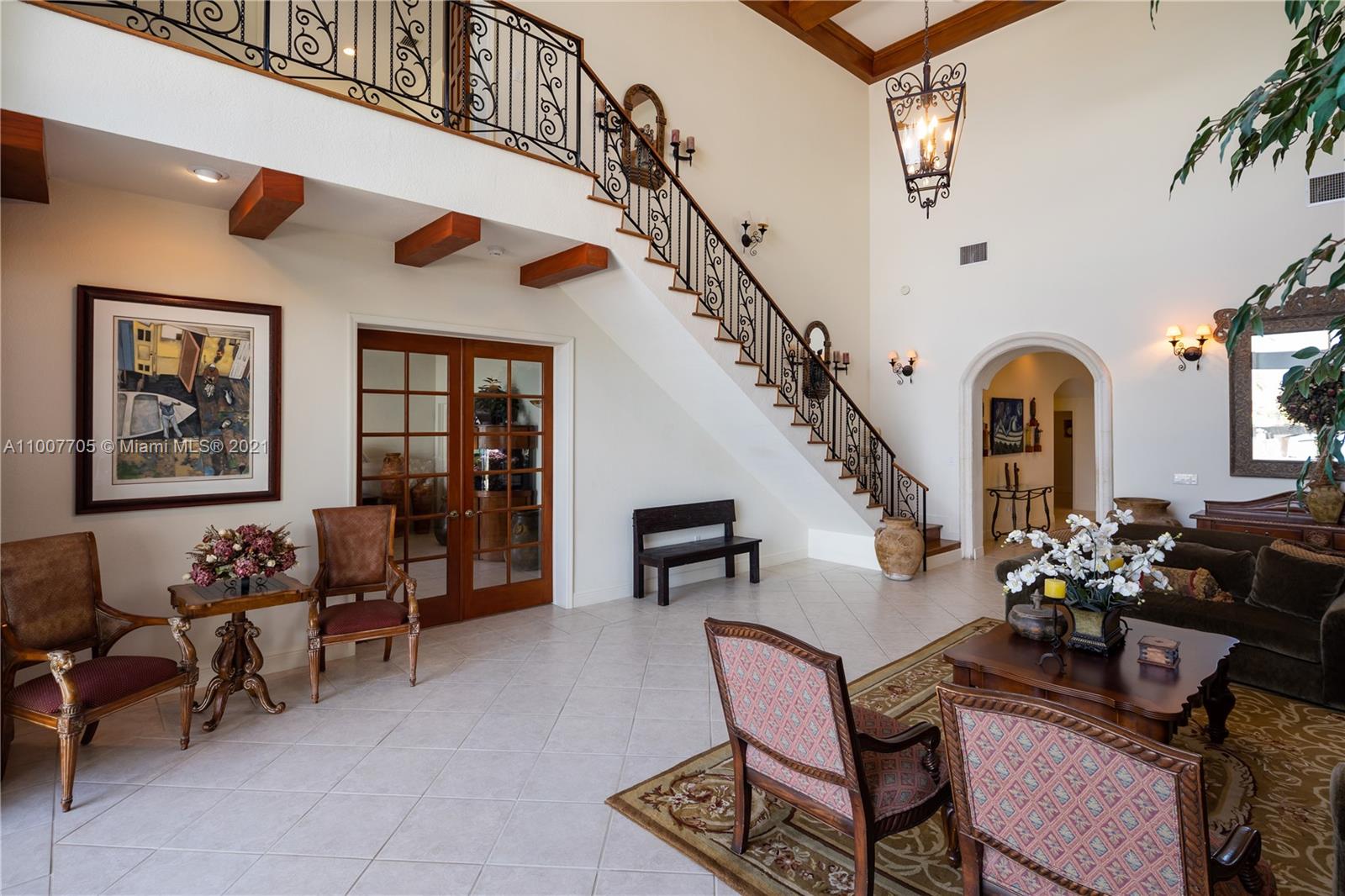 1385 North Biscayne Point Road Miami Beach, FL 33141 - Photo 16 of 68 a living room with furniture and flowers