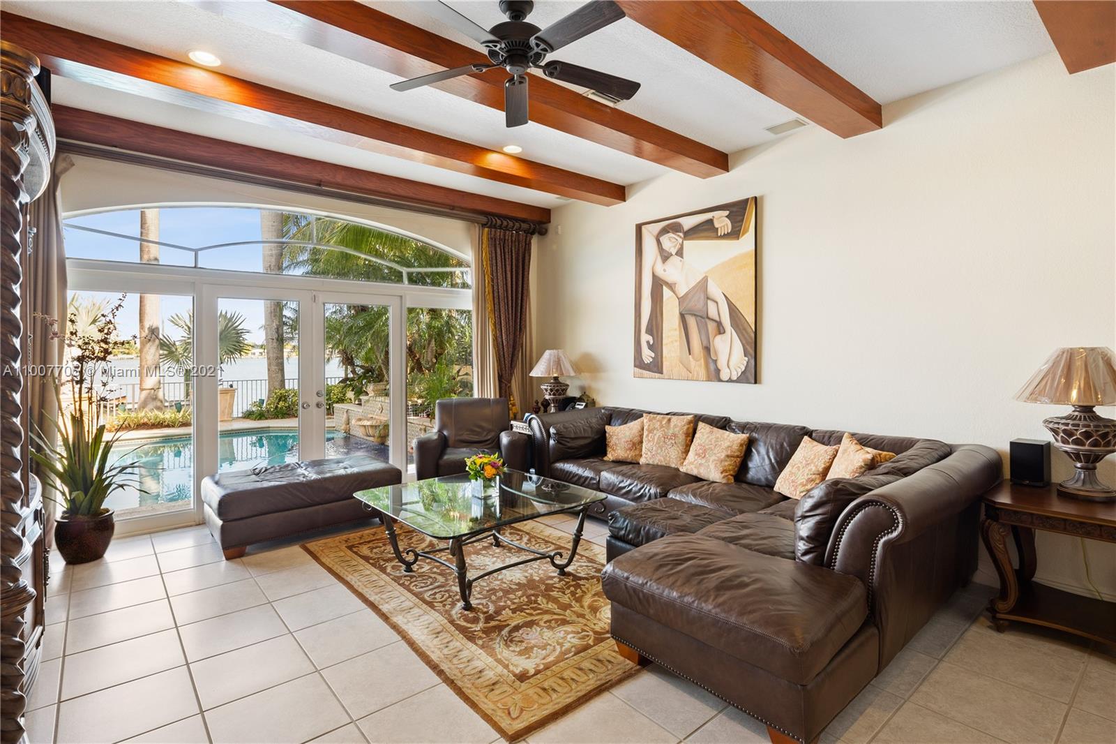 1385 North Biscayne Point Road Miami Beach, FL 33141 - Photo 20 of 68 a living room with furniture and a large window