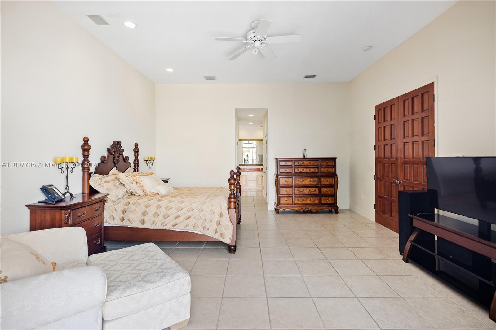 1385 North Biscayne Point Road Miami Beach, FL 33141 - Photo 25 of 68 a bedroom with furniture and a couch