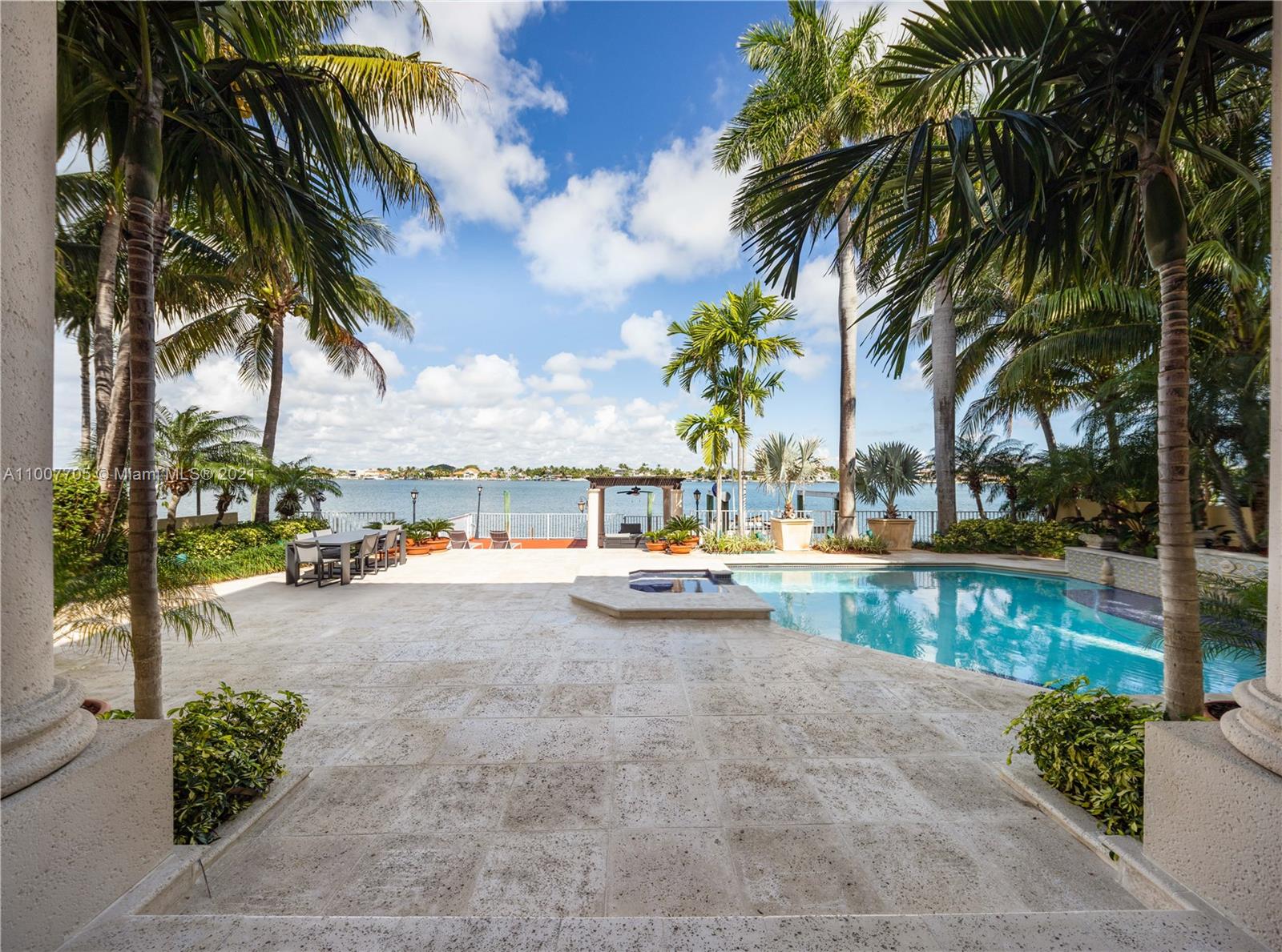 1385 North Biscayne Point Road Miami Beach, FL 33141 - Photo 30 of 68 a view of swimming pool with outdoor seating and a patio